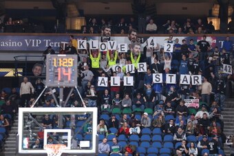 MINNEAPOLIS, MN - FEBRUARY 12:  The fans hold up signs in support of Kevin Love during the game against the Denver Nuggets on February 12, 2014 at Target Center in Minneapolis, Minnesota. NOTE TO USER: User expressly acknowledges and agrees that, by downl