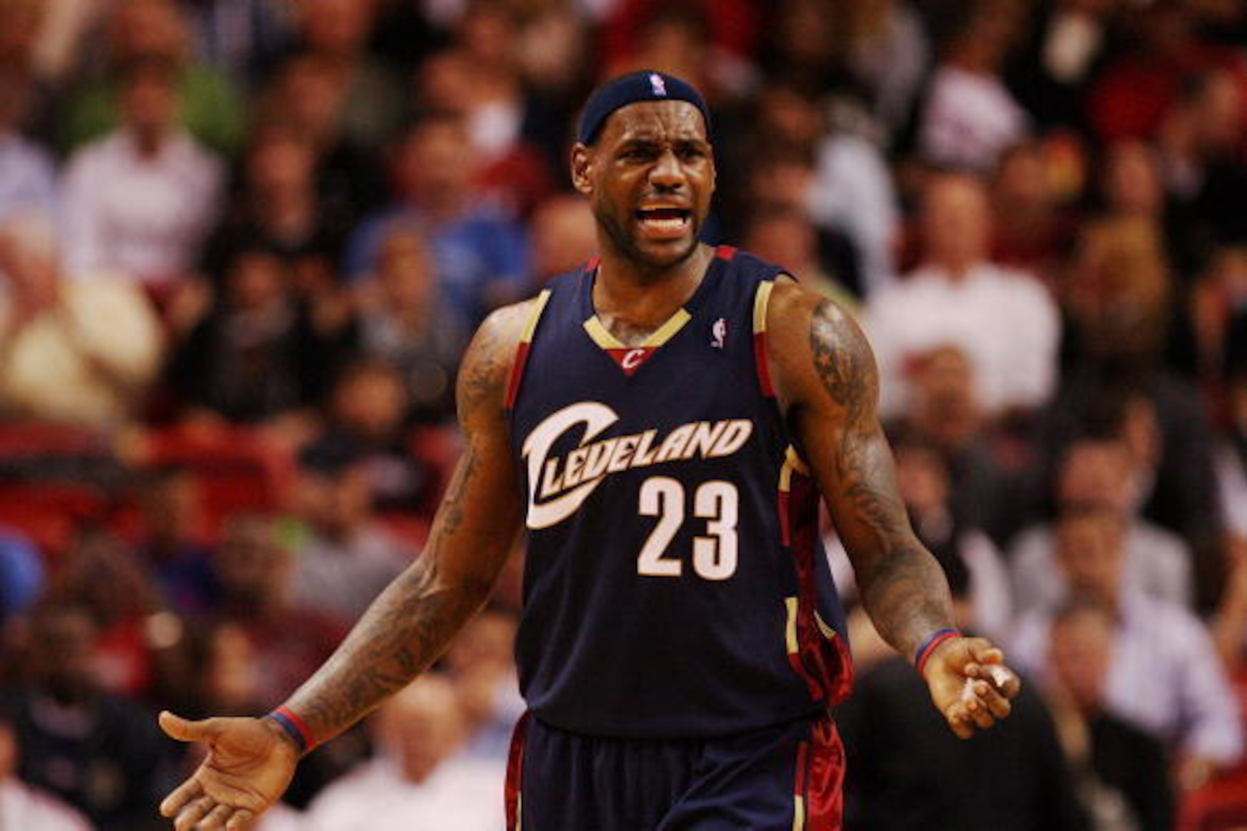MIAMI - DECEMBER 30:  LeBron James #23 of the Cleveland Cavaliers reacts after being called for a technical foul while taking on the Miami Heat at American Airlines Arena on December 30, 2008 in Miami, Florida. The Heat defeated the Cavaliers 104-95. NOTE