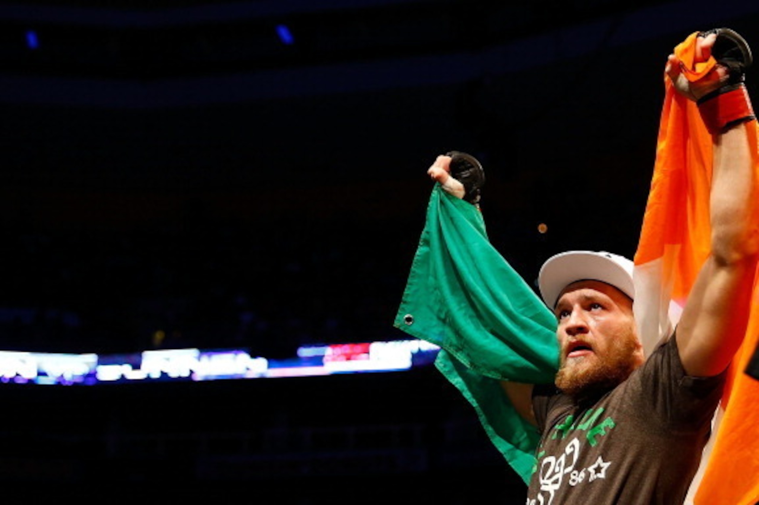 BOSTON, MA - AUGUST 17: Conor McGregor celebrates following his win against Max Holloway in their featherweight bout at TD Garden on August 17, 2013 in Boston, Massachusetts. (Photo by Jared Wickerham/Getty Images)