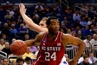 ORLANDO, FL - MARCH 20:  T.J. Warren #24 of the North Carolina State Wolfpack drives to the basket against Jake Barnett #30 of the Saint Louis Billikens during the second round of the 2014 NCAA Men's Basketball Tournament at Amway Center on March 20, 2014