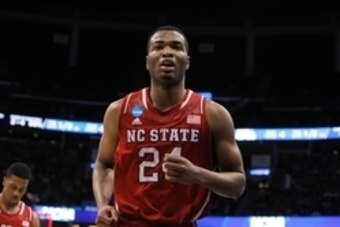 Mar 20, 2014; Orlando, FL, USA; North Carolina State Wolfpack forward T.J. Warren (24) runs on the court against the Saint Louis Billikens during the first half of a men's college basketball game during the second round of the 2014 NCAA Tournament at Amwa