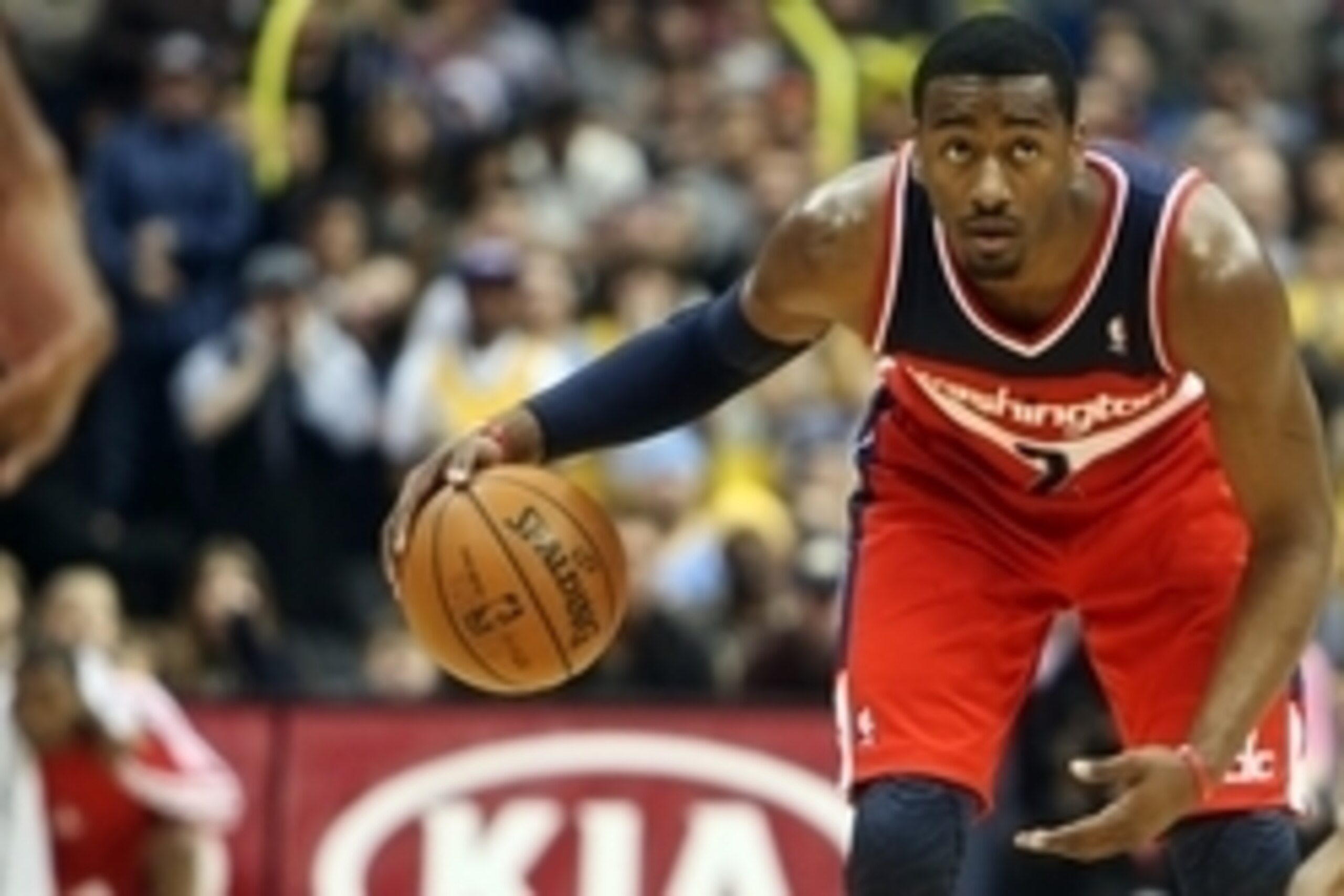 January 18, 2013; Denver, CO, USA; Washington Wizards guard John Wall (2) with the ball during the second half against the Denver Nuggets at the Pepsi Center.  The Wizards won 112-108.  Mandatory Credit: Chris Humphreys-USA TODAY Sports