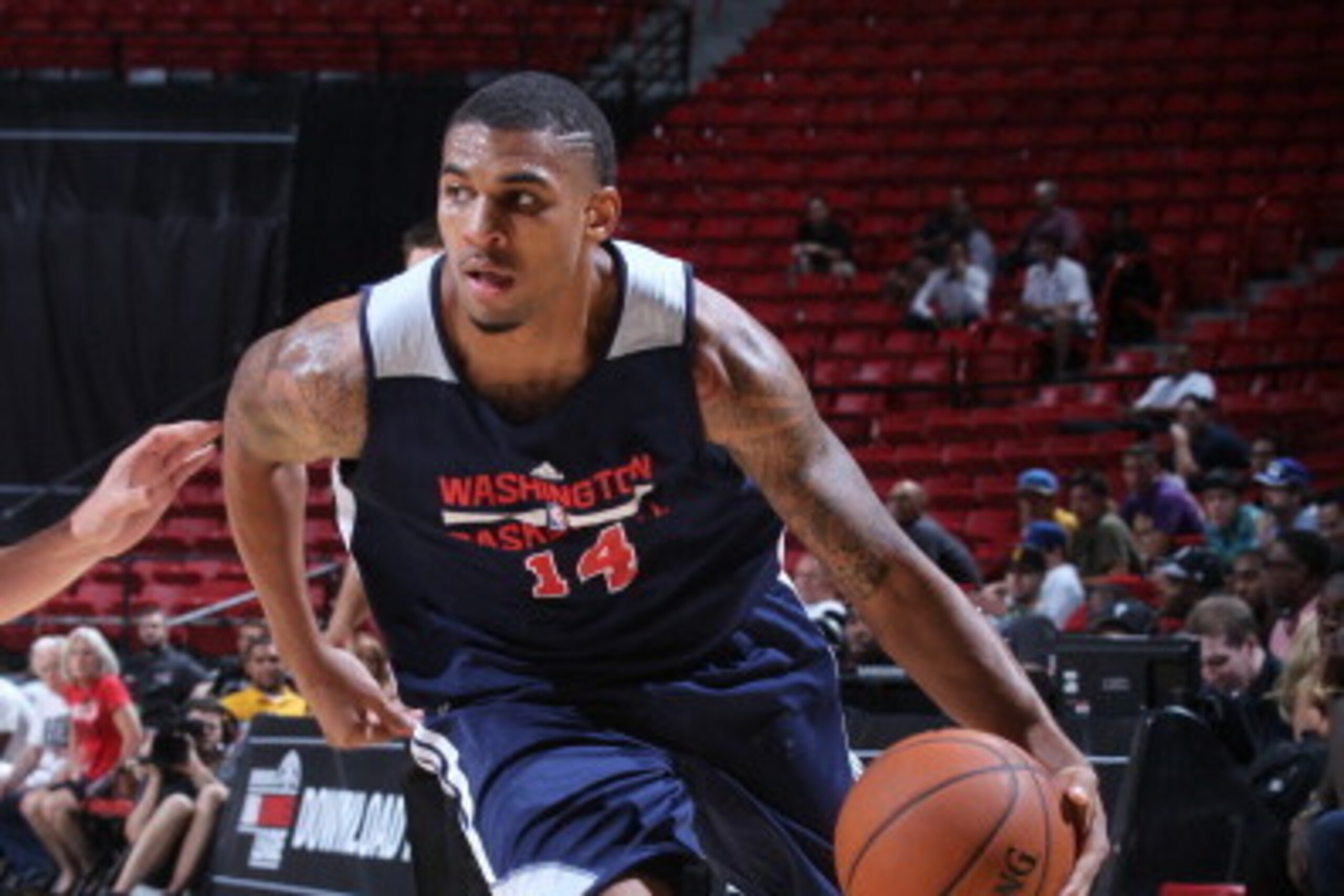 LAS VEGAS, NV - JULY 13: Glen Rice Jr. #14 of the Washington Wizards handles the ball against the Minnesota Timberwolves at the Samsung NBA Summer League 2014 on July 13, 2014 at the Thomas & Mack Center in Las Vegas, Nevada. NOTE TO USER: User expressly 