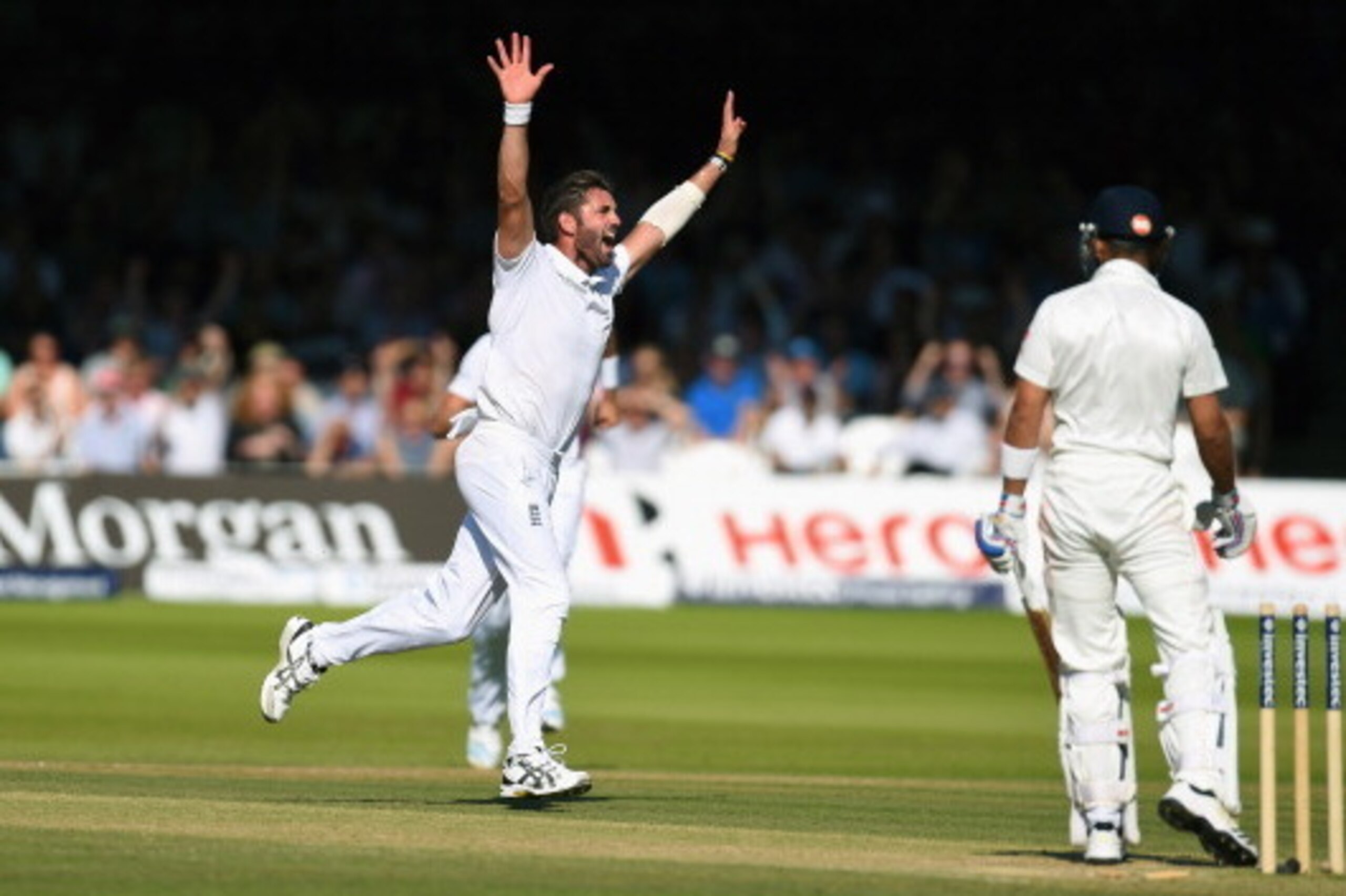 LONDON, ENGLAND - JULY 19:  England bowler Liam Plunkett celebrates after dismissing India batsman Virat Kholi  during day three of 2nd Investec Test match between England and India at Lord's Cricket Ground on July 19, 2014 in London, United Kingdom.  (Ph