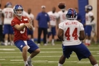 Jun 12, 2014; East Rutherford, NJ, USA; New York Giants quarterback Ryan Nassib (9) throws the ball during New York Giants minicamp at the Quest Diagnostics Training Center. William Perlman/The Star-Ledger-USA TODAY Sports