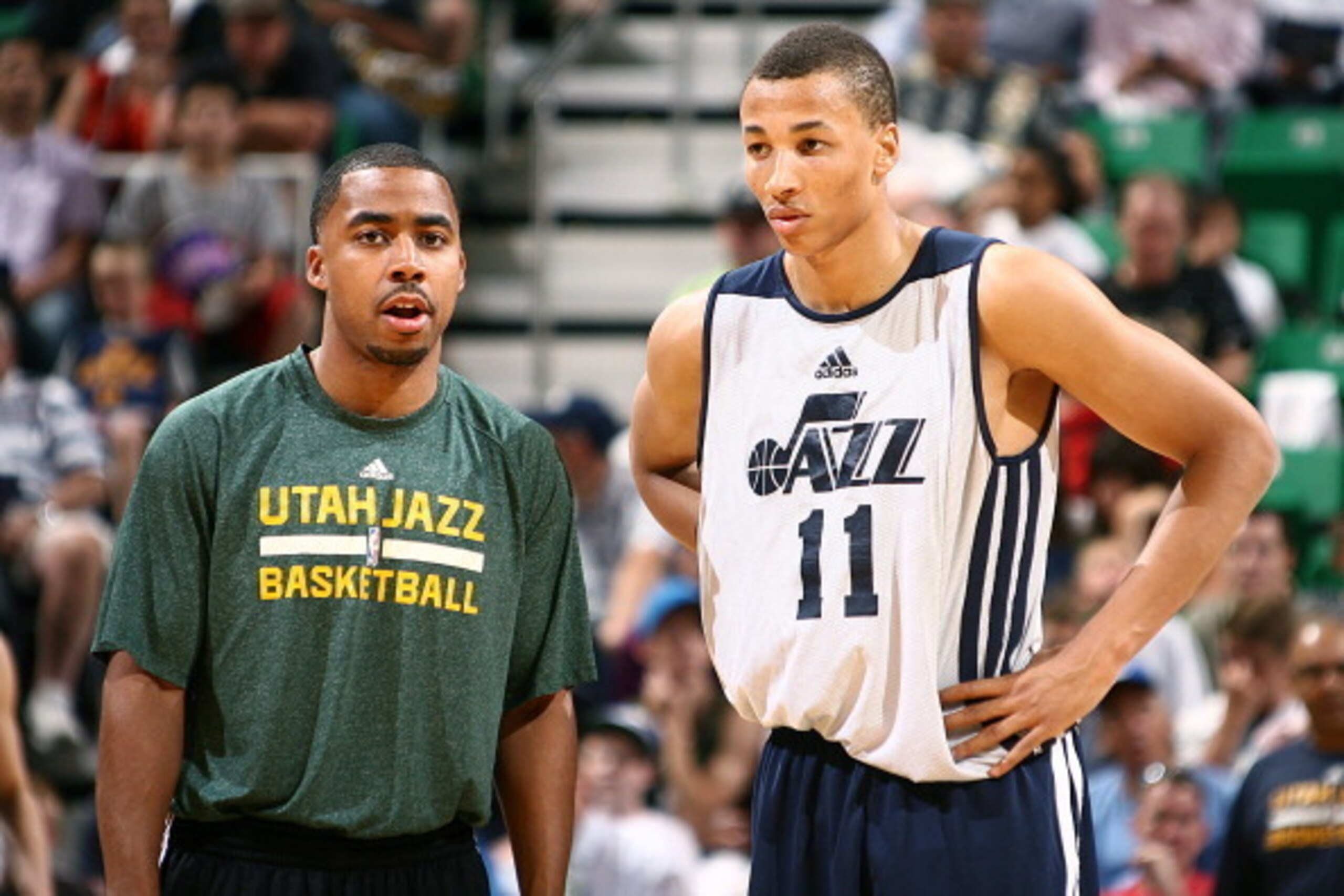 SALT LAKE CITY, UT - JULY 8:  Johnnie Bryant Assistant Coach and Dante Exum #11 of the Utah Jazz talk on the court during an open scrimmage at Energy Solutions Arena on July 8, 2014 in Salt Lake City, Utah. NOTE TO USER: User expressly acknowledges and ag