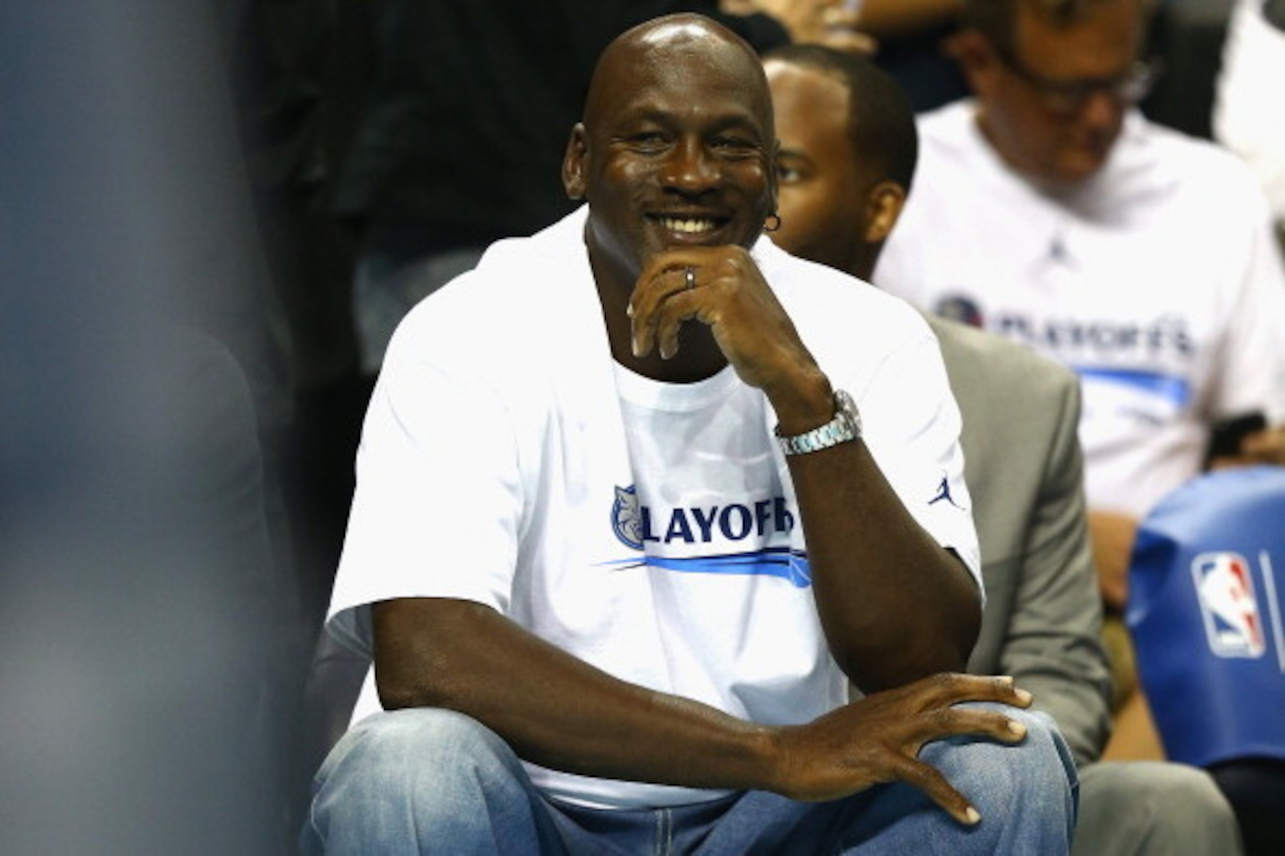 CHARLOTTE, NC - APRIL 28:  Charlotte Bobcats owner Michael Jordan watches on against the Miami Heat in Game Four of the Eastern Conference Quarterfinals during the 2014 NBA Playoffs at Time Warner Cable Arena on April 28, 2014 in Charlotte, North Carolina