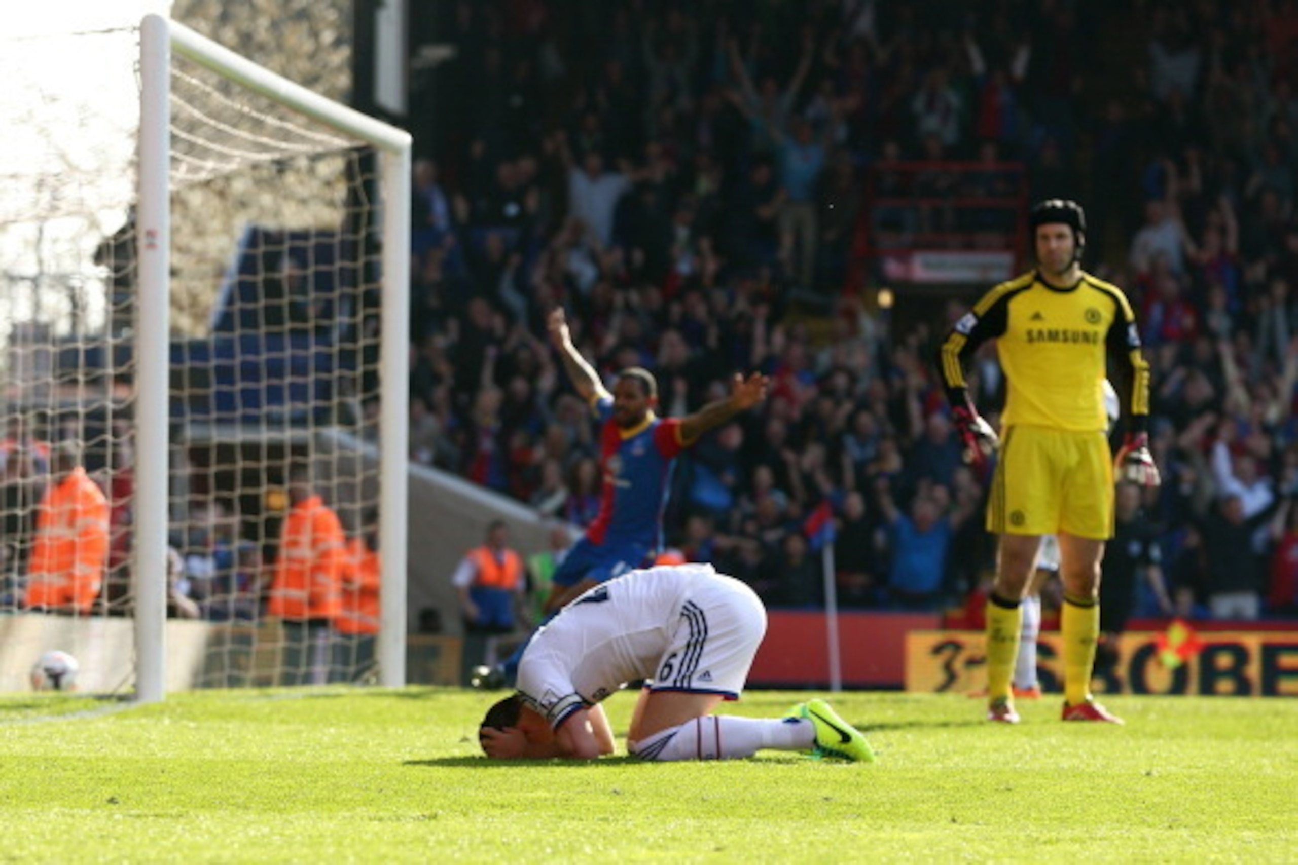 LONDON, ENGLAND - MARCH 29:  A dejected John Terry (C) of Chelsea reacts after opening the scoring with an own goal during the Barclays Premier League match between Crystal Palace and Chelsea at Selhurst Park on March 29, 2014 in London, England.  (Photo 