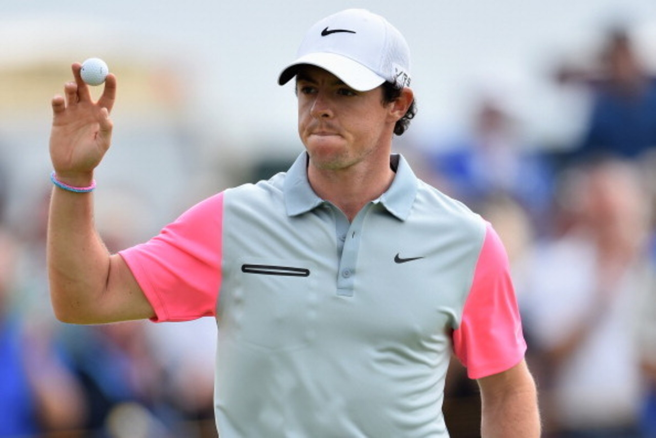 HOYLAKE, ENGLAND - JULY 20:  Rory McIlroy of Northern Ireland reacts to his birdie putt on the ninth green during the final round of The 143rd Open Championship at Royal Liverpool on July 20, 2014 in Hoylake, England.  (Photo by Stuart Franklin/Getty Imag