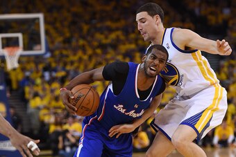 OAKLAND, CA - APRIL 27:  Chris Paul #3 of the Los Angeles Clippers drives on Klay Thompson #11 of the Golden State Warriors in Game Four of the Western Conference Quarterfinals during the 2014 NBA Playoffs at ORACLE Arena on April 27, 2014 in Oakland, Cal