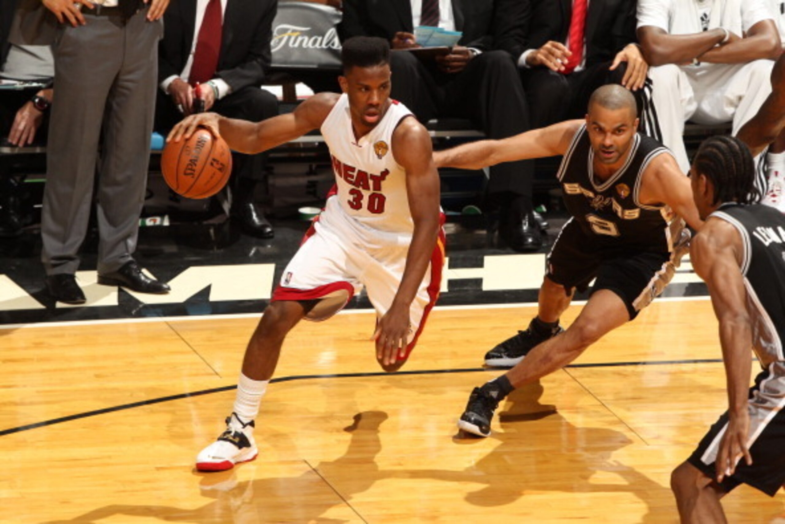 MIAMI, FL - JUNE 10: Norris Cole #30 of the Miami Heat handles the ball against the San Antonio Spurs during Game Three of the 2014 NBA Finals at the American Airlines Arena in Miami, Florida on June 10, 2014. NOTE TO USER: User expressly acknowledges and