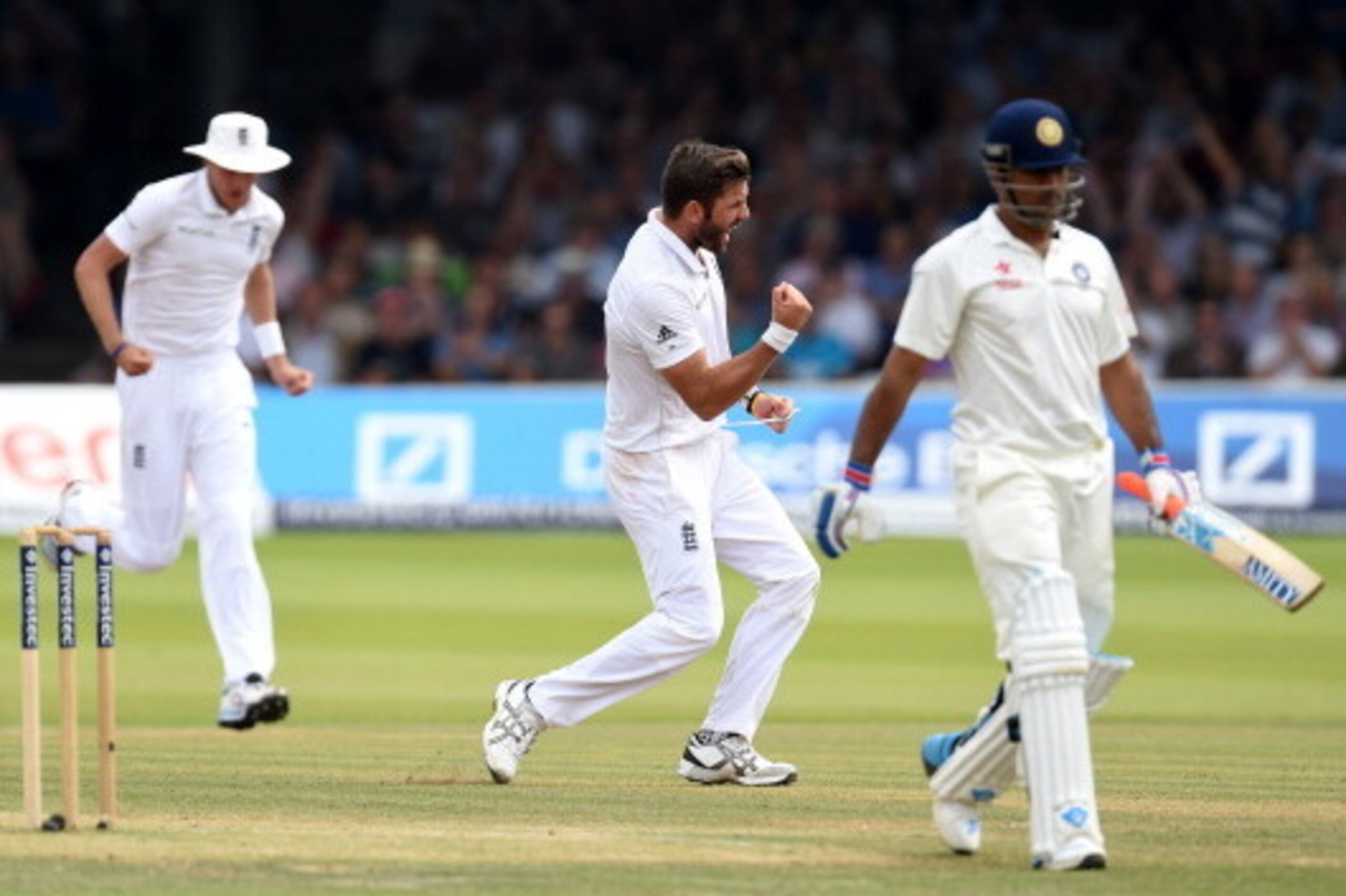 LONDON, ENGLAND - JULY 20:  England bowler Liam Plunkett celebrates after dismissing India batsman Mahendra Singh Dhoni during day four of 2nd Investec Test match between England and India at Lord's Cricket Ground on July 20, 2014 in London, United Kingdo