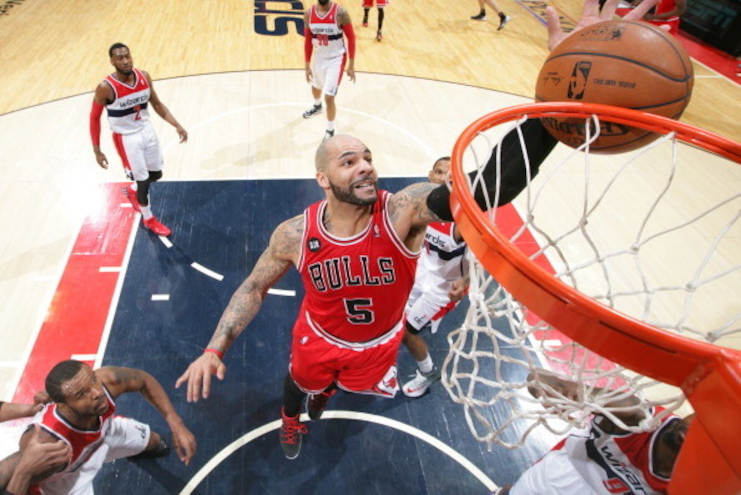 WASHINGTON, DC - APRIL 27: Carlos Boozer #5 of the Chicago Bulls grabs a rebound against the Washington Wizards in Game Four of the Eastern Conference Quarterfinals during the 2014 NBA Playoffs at the Verizon Center on April 27, 2014 in Washington, DC. NO