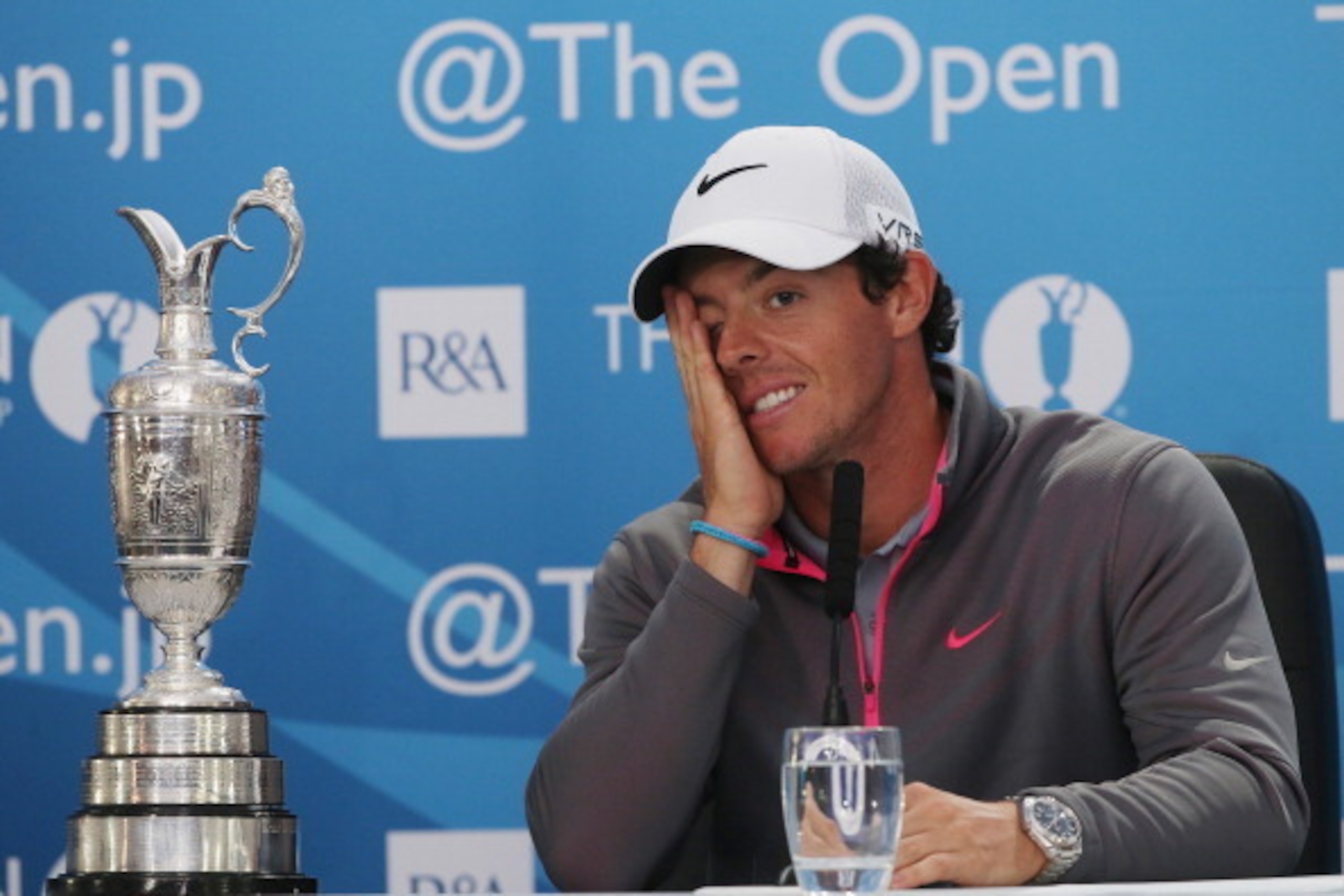 HOYLAKE, ENGLAND - JULY 20:  Rory McIlroy of Northern Ireland answers questions from the media after his two-stroke victory at The 143rd Open Championship at Royal Liverpool on July 20, 2014 in Hoylake, England.  (Photo by Andrew Redington/Getty Images)
