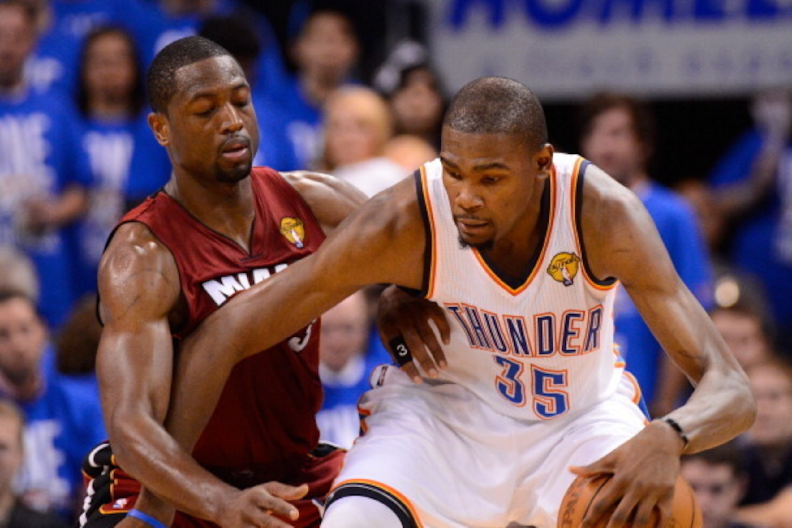 OKLAHOMA CITY, OK - JUNE 12:  Kevin Durant #35 of the Oklahoma City Thunder posts up Dwyane Wade #3 of the Miami Heat in the fourth quarter in Game One of the 2012 NBA Finals at Chesapeake Energy Arena on June 12, 2012 in Oklahoma City, Oklahoma. NOTE TO 