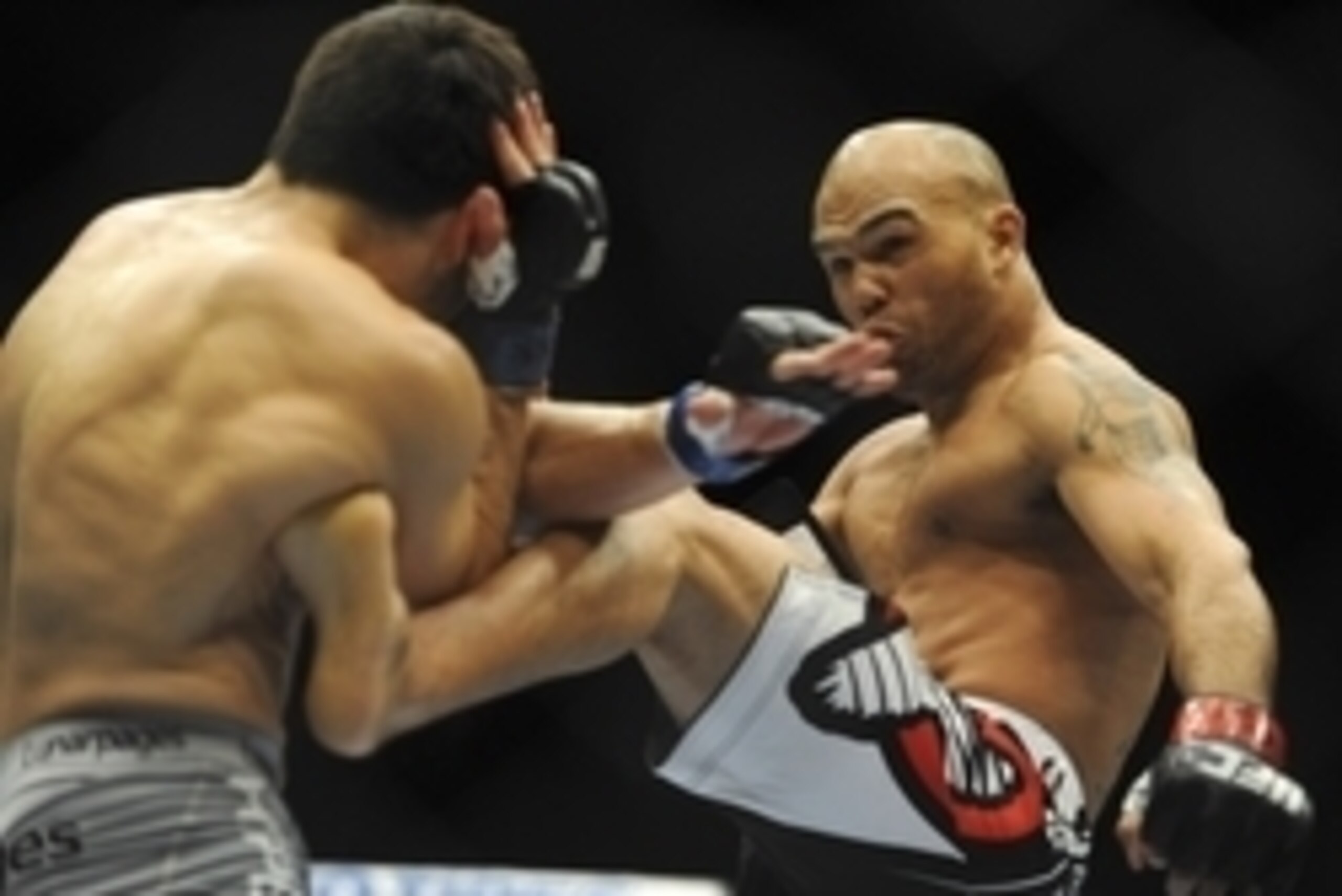 May 24, 2014; Las Vegas, NV, USA; Robbie Lawler (red) kicks Jake Ellenberger (blue) during their UFC 173 light heavyweight bout at MGM Grand Garden Arena. Lawler won his bout by way of TKO. Mandatory Credit: Stephen R. Sylvanie-USA TODAY Sports