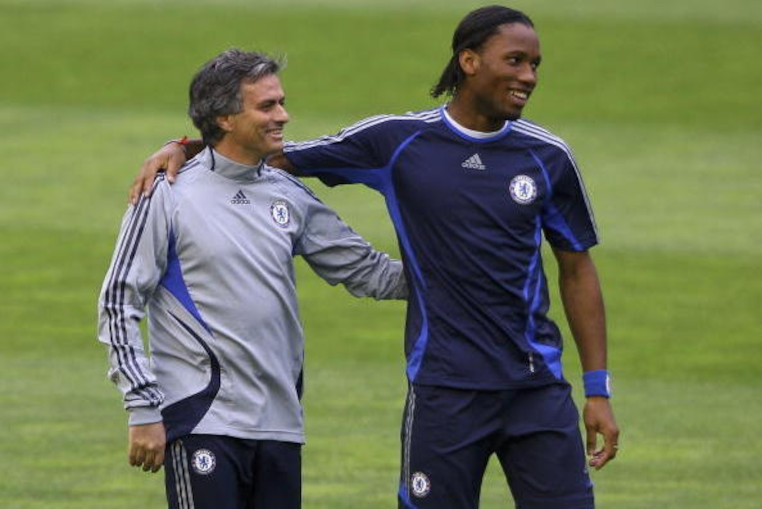 VALENCIA, SPAIN - APRIL 09: Chelsea Coach Jose Mourinho (L) shares a joke with striker Didier Drogba  during Chelsea training and press conference ahead of tomorrow's Champions League Quarter Final Second Leg match against Valencia, at the Stadium Mestall