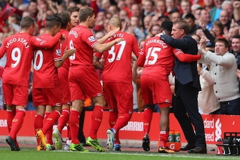 LIVERPOOL, ENGLAND - SEPTEMBER 01:  Daniel Sturridge of Liverpool celebrates scoring the opening goal with Manager Brendan Rodgers during the Barclays Premier League match between Liverpool and Manchester United at Anfield on September 01, 2013 in Liverpo