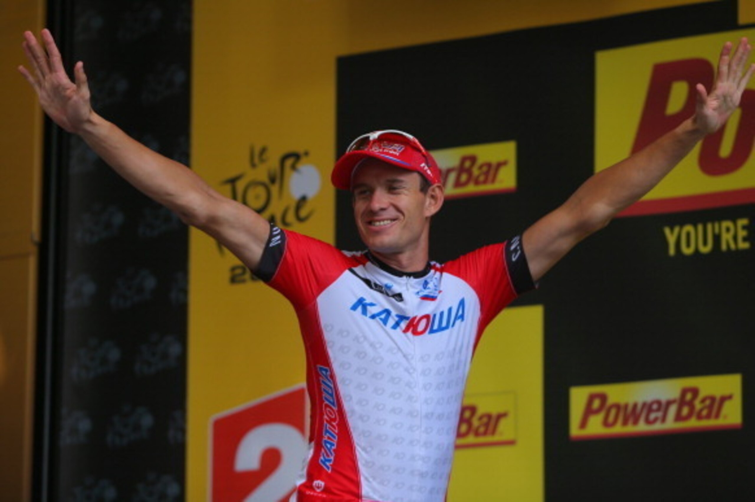 NIMES, FRANCE - JULY 20:  Alexander Kristoff of Noraway and Team Katusha celebrates on the podium after winning the fifteenth stage of the 2014 Tour de France, a 222km stage between Tallard and Nimes, on July 20, 2014 in Nimes, France.  (Photo by Doug Pen