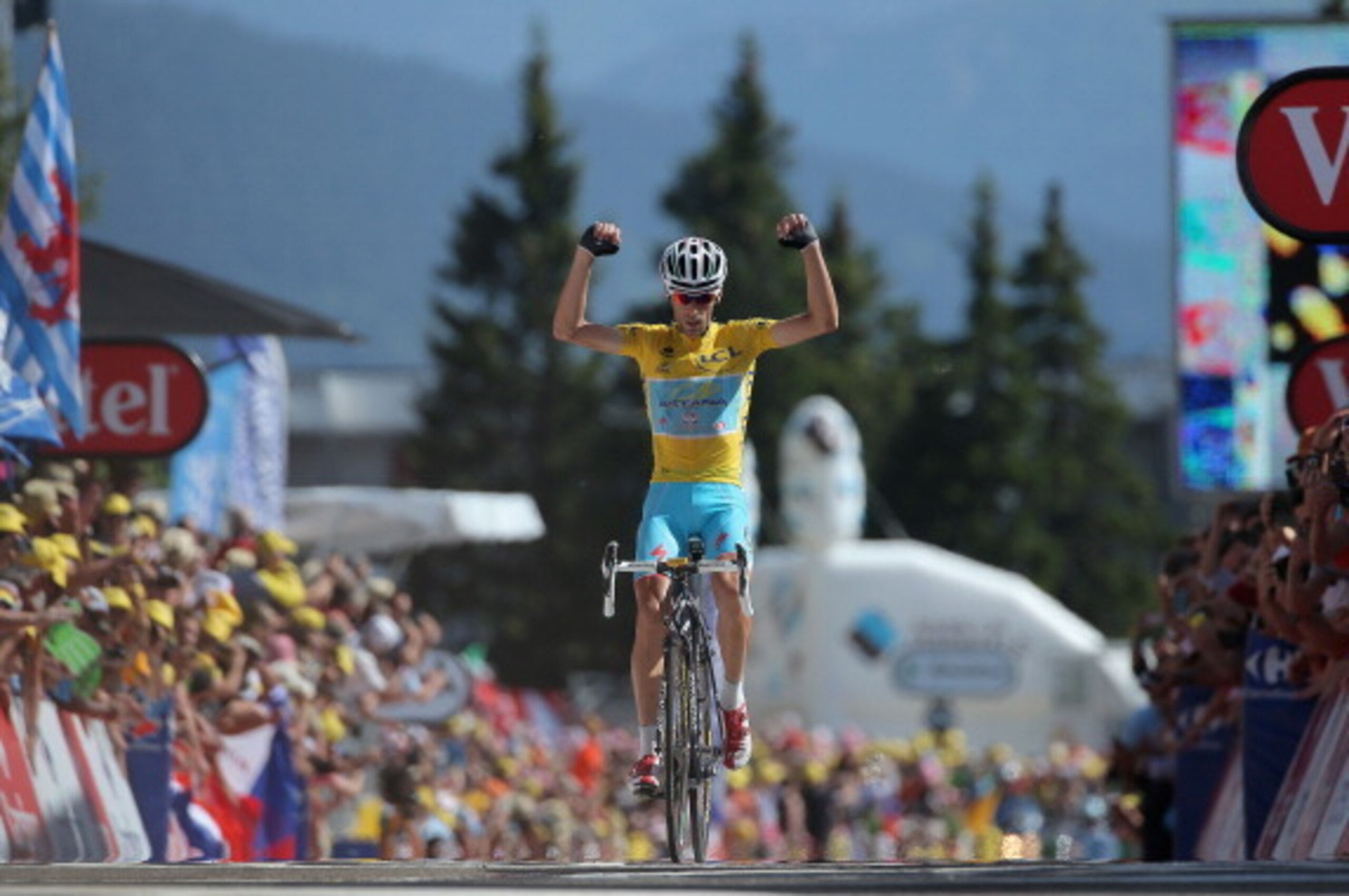 CHAMROUSSE, FRANCE - JULY 18:  Vincenzo Nibali of Italy and the Astana Pro Team celebrates as he defends the overall race leader's yellow jersey and wins the thirteenth stage of the 2014 Tour de France, a 197km stage between Saint-Etienne and Chamrousse, 