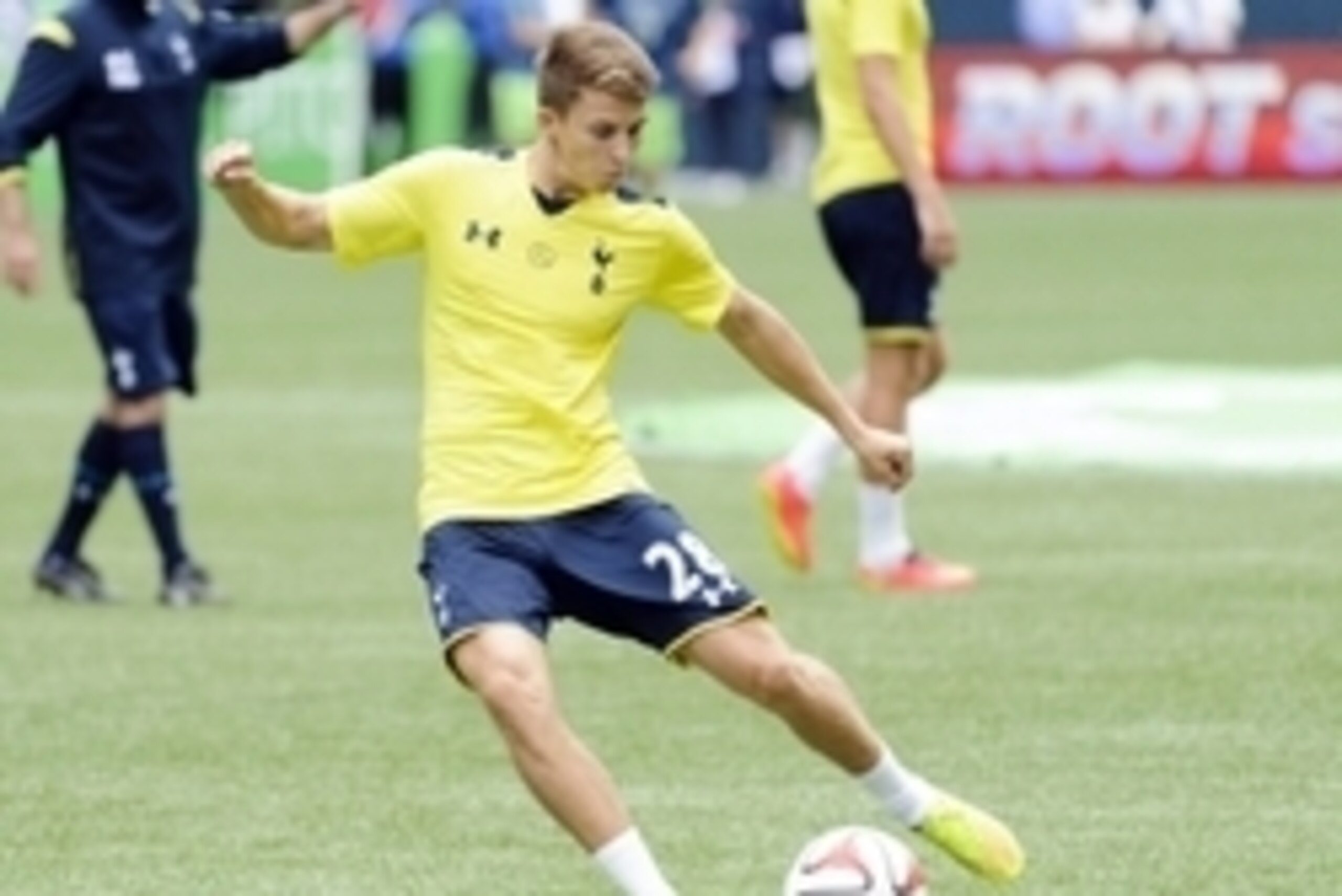 Jul 19, 2014; Seattle, WA, USA; Tottenham Hotspur midfielder Thomas Carroll (28) shoots a goal shot during pre game warm ups prior to the game against the Seattle Sounders FC at CenturyLink Field. Mandatory Credit: Steven Bisig-USA TODAY Sports