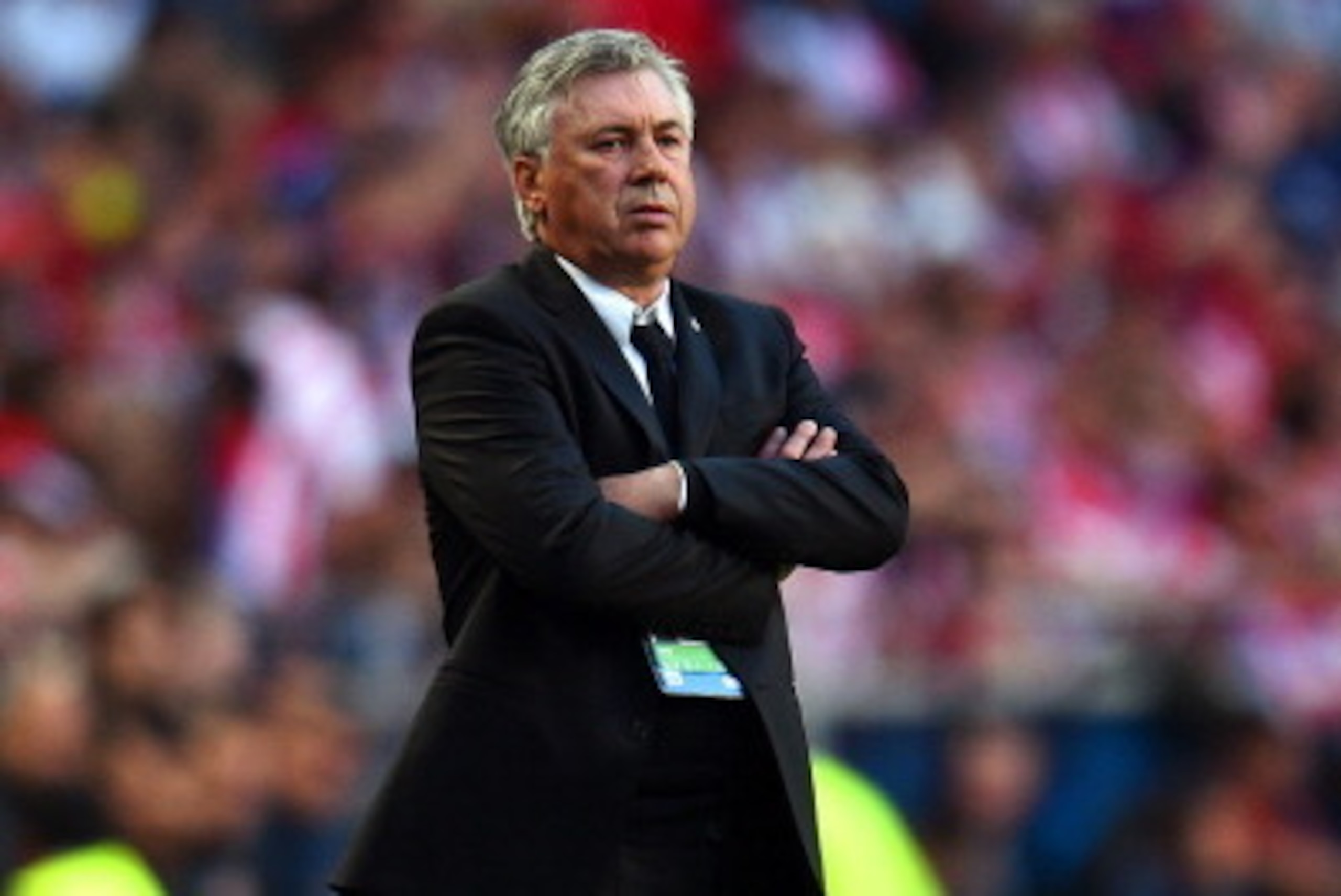 LISBON, PORTUGAL - MAY 24:  Head Coach, Carlo Ancelotti of Real Madrid folds his arms during the UEFA Champions League Final between Real Madrid and Atletico de Madrid at Estadio da Luz on May 24, 2014 in Lisbon, Portugal.  (Photo by Shaun Botterill/Getty