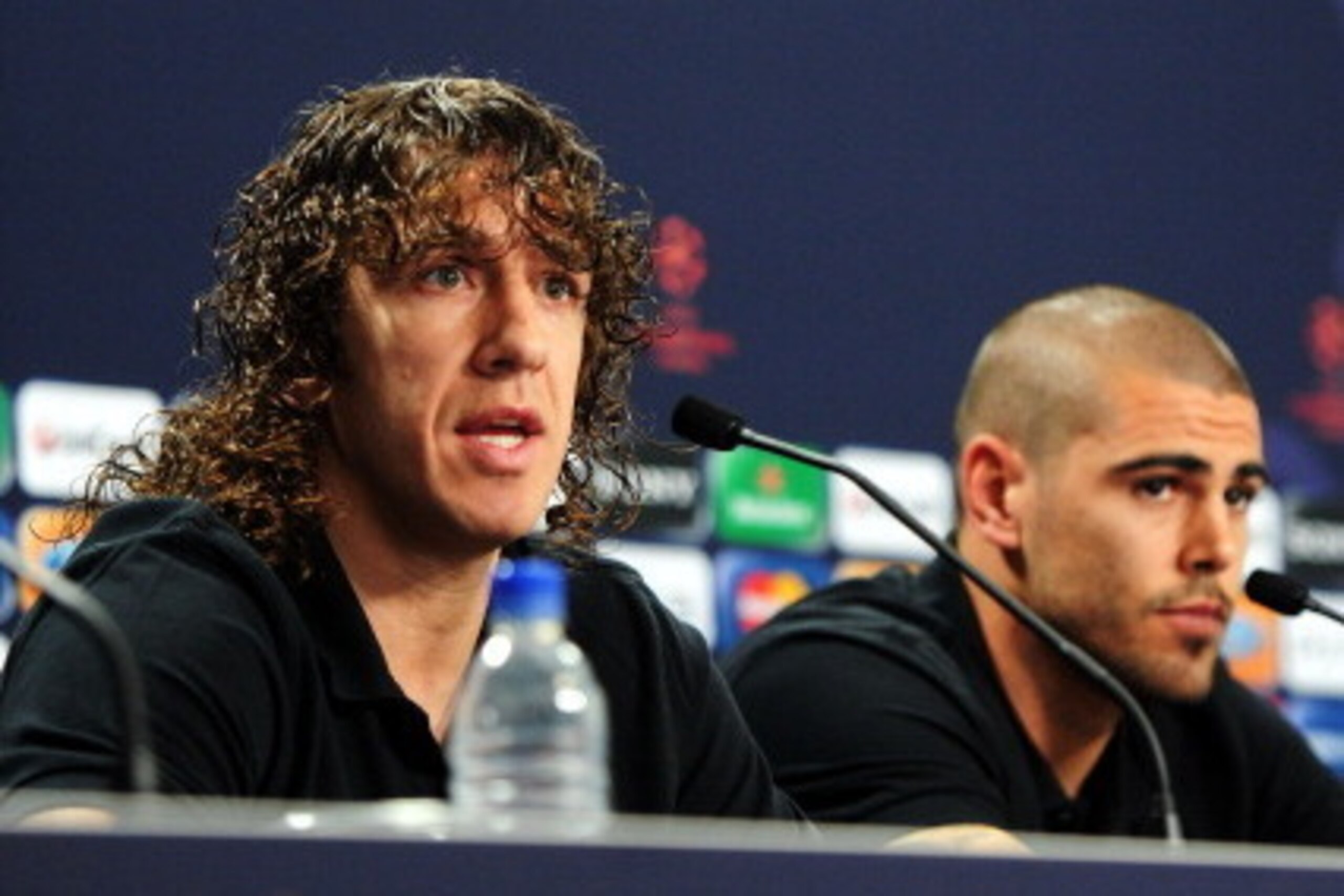 LONDON, ENGLAND - MAY 27:  In this UEFA handout image Victor Valdes (R) and Carles Puyol attend the FC Barcelona press conference ahead of the UEFA Champions League Final against Manchester United at Wembley Stadium on May 27, 2011 in London, England.  (P