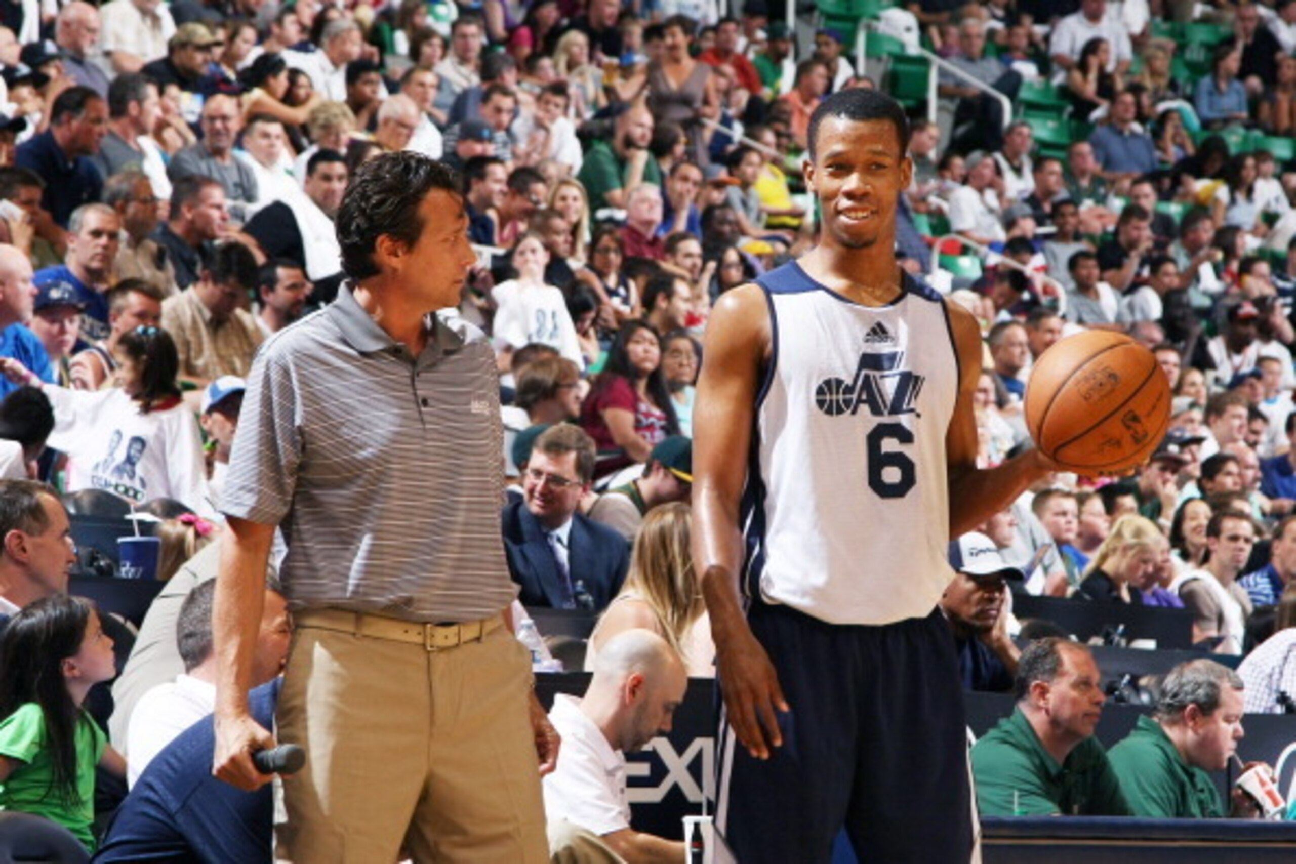 SALT LAKE CITY, UT - JULY 8:  Quin Snyder Head Coach and Rodney Hood #6 of the Utah Jazz talk on the court during an open scrimmage at Energy Solutions Arena on July 8, 2014 in Salt Lake City, Utah. NOTE TO USER: User expressly acknowledges and agrees tha