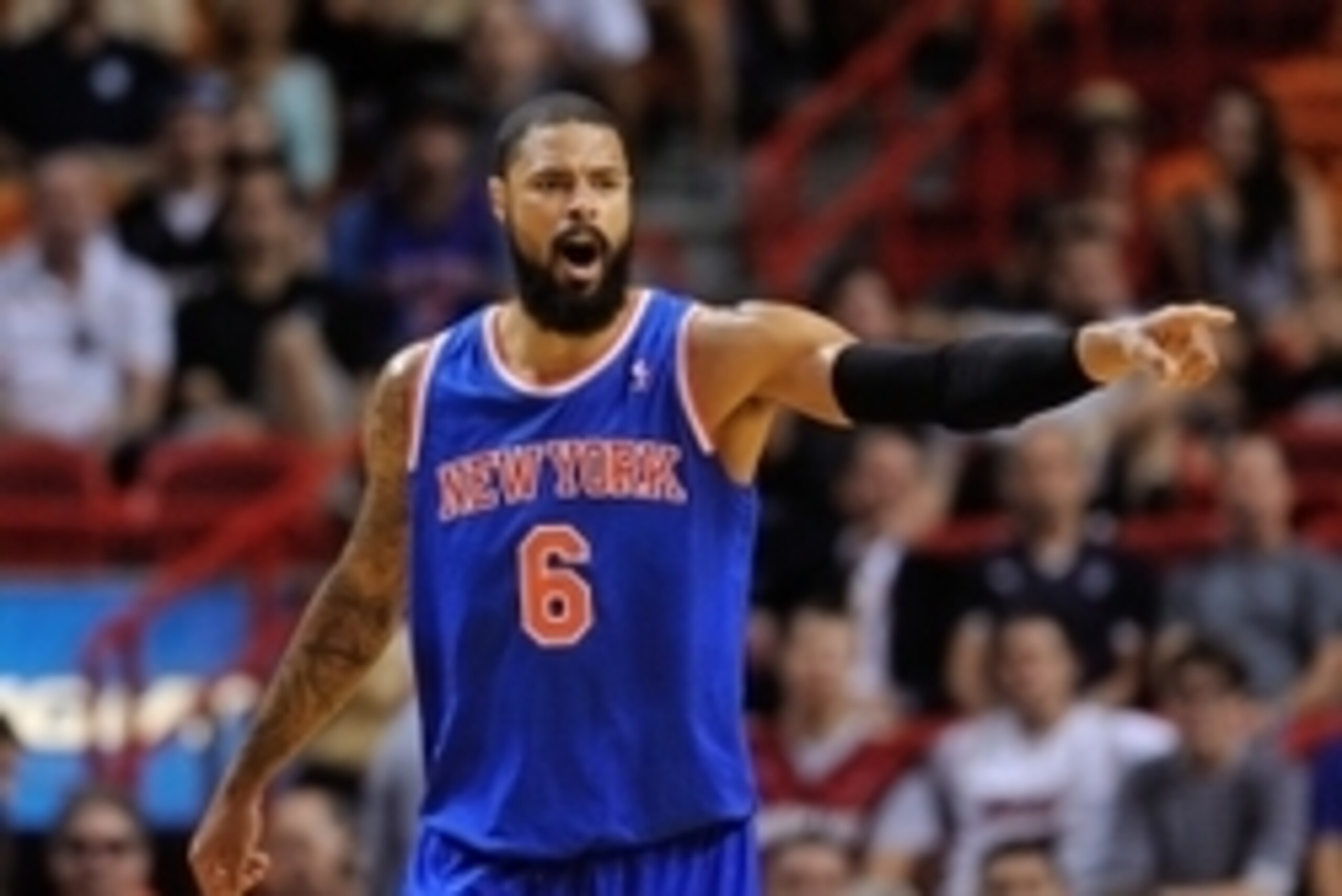 Apr 6, 2014; Miami, FL, USA; New York Knicks center Tyson Chandler (6) reacts during the first half against the Miami Heat at American Airlines Arena. Mandatory Credit: Steve Mitchell-USA TODAY Sports