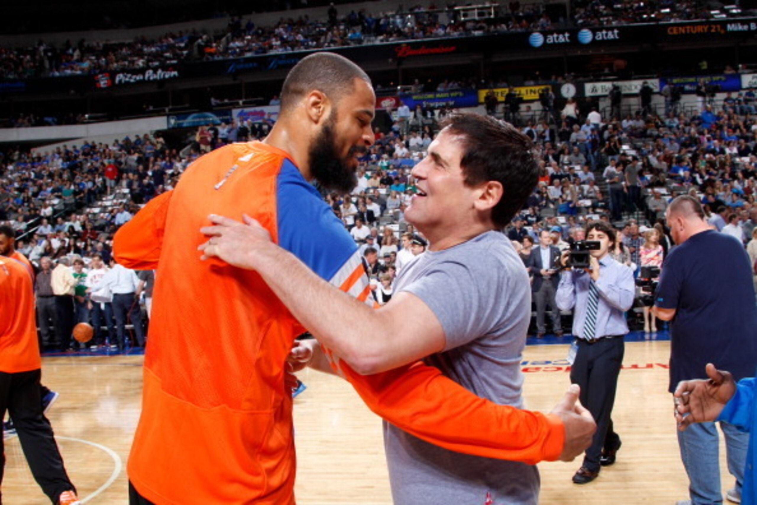 DALLAS, TX - MARCH 6: Former Maverick Tyson Chandler #6 of the New York Knicks hugs his former owner Mark Cuban as Chandler received his 2010-2011 NBA Championship ring prior to a game against the Dallas Mavericks on March 6, 2012 at the American Airlines
