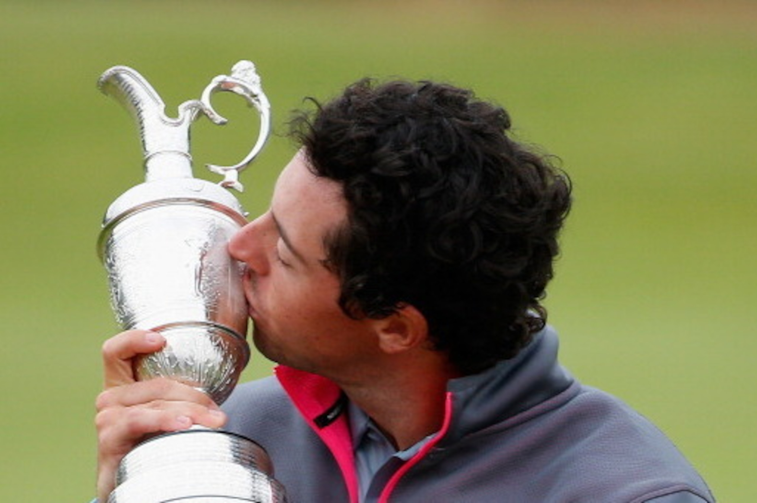HOYLAKE, ENGLAND - JULY 20:  Rory McIlroy of Northern Ireland kisses the Claret Jug after his two-stroke victory at The 143rd Open Championship at Royal Liverpool on July 20, 2014 in Hoylake, England.  (Photo by Tom Pennington/Getty Images)
