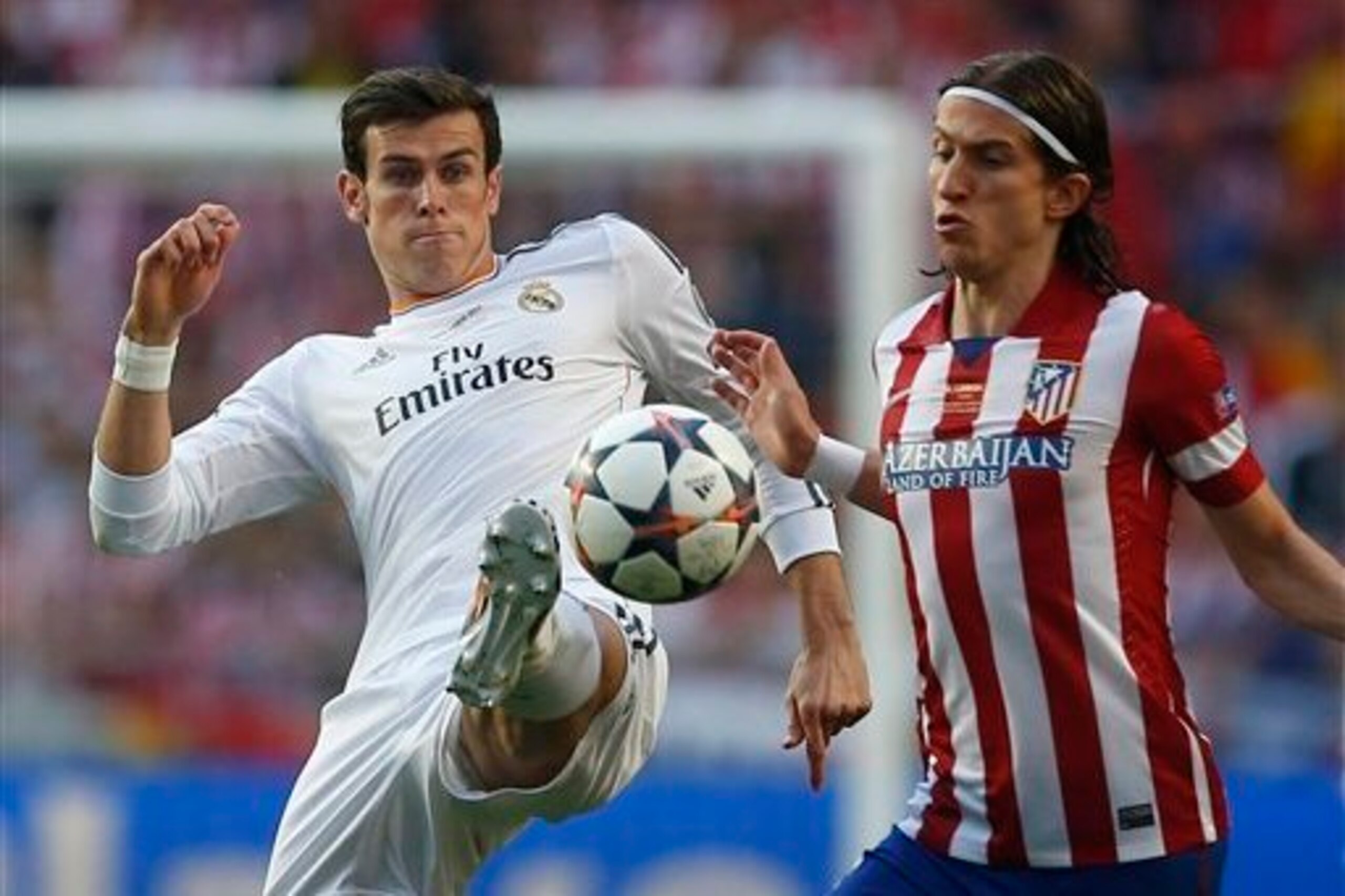 Filipe Luis, right, will be a strong addition for Chelsea, says Janusz Michallik.