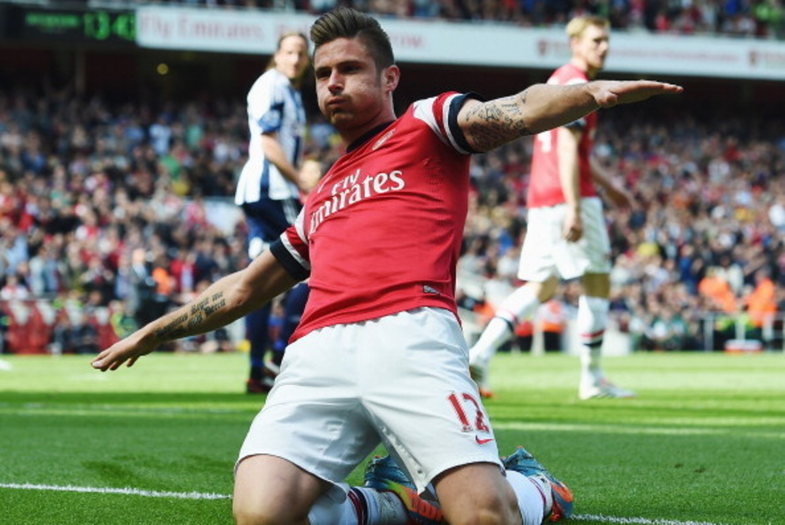 LONDON, ENGLAND - MAY 04:  Olivier Giroud of Arsenal after scoring during the Barclays Premier League match between Arsenal and West Bromwich Albion at the Emirates Stadium on May 4, 2014 in London, England.  (Photo by Shaun Botterill/Getty Images)