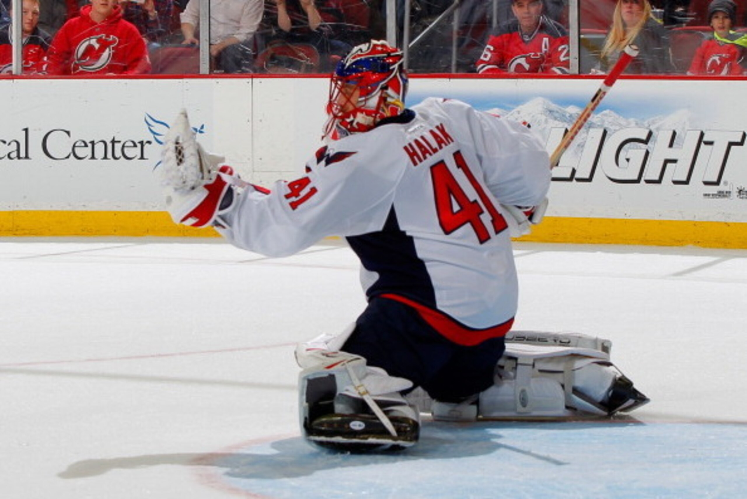 NEWARK, NJ - APRIL 04: Jaroslav Halak #41 of the Washington Capitals makes a glove against the New Jersey Devils during the game at the Prudential Center on April 4, 2014 in Newark, New Jersey. (Photo by Andy Marlin/NHLI via Getty Images)