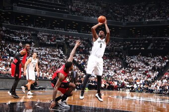 BROOKLYN, NY - MAY 2: Andray Blatche #0 of the Brooklyn Nets shoots the ball against the Toronto Raptors during Game Six of the Eastern Conference Quarterfinals at Barclays Center on May 2, 2014 in the Brooklyn borough of New York City.  NOTE TO USER: Use
