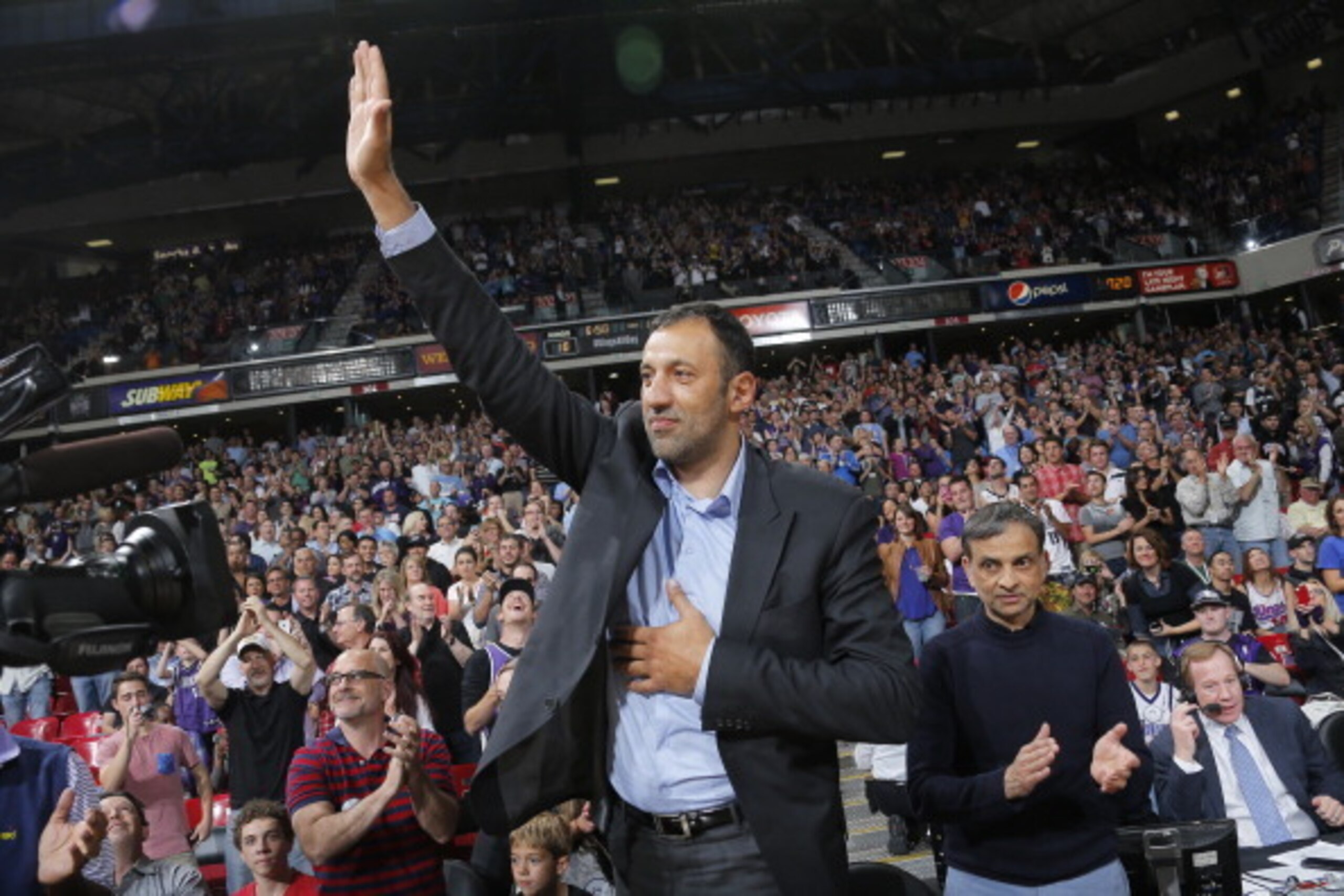 SACRAMENTO, CA - MARCH 21: Former Sacramento Kings player Vlade Divac waves to the fans during the game against the San Antonio Spurs on March 21, 2014 at Sleep Train Arena in Sacramento, California. NOTE TO USER: User expressly acknowledges and agrees th