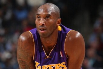 MEMPHIS, TN - DECEMBER 17: Kobe Bryant #24 of the Los Angeles Lakers looks on during the game against the Memphis Grizzlies on December 17, 2013 at FedExForum in Memphis, Tennessee. NOTE TO USER: User expressly acknowledges and agrees that, by downloading