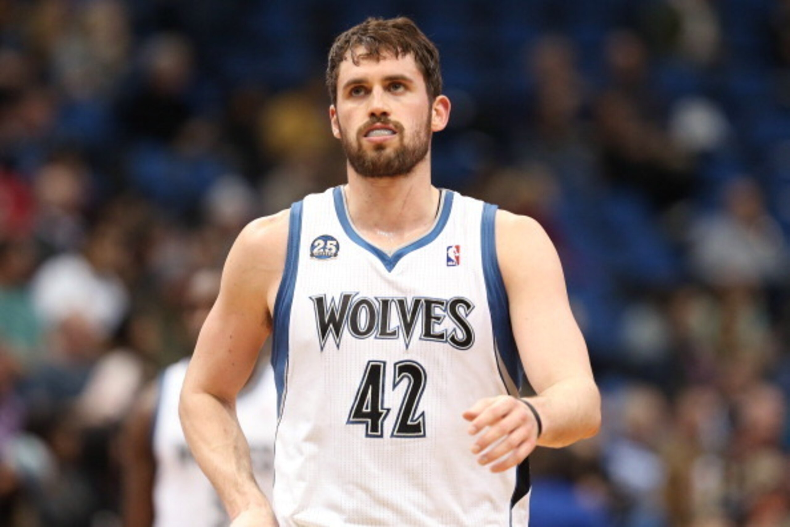 MINNEAPOLIS, MN - MARCH 26: Kevin Love #42 of the Minnesota Timberwolves on the court during the game against the Atlanta Hawks on March 26, 2014 at Target Center in Minneapolis, Minnesota. NOTE TO USER: User expressly acknowledges and agrees that, by dow MINNEAPOLIS, MN - MARCH 26: Kevin Love #42 of the Minnesota Timberwolves on the court during the game against the Atlanta Hawks on March 26, 2014 at Target Center in Minneapolis, Minnesota. NOTE TO USER: User expressly acknowledges and agrees that, by dow