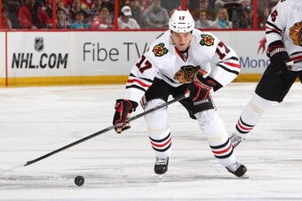 GATINEAU, CANADA - MARCH 28: Sheldon Brookbank #17 of the Chicago Blackhawks skates with the puck against the Ottawa Senators at Canadian Tire Centre on March 28, 2014 in Ottawa, Ontario, Canada. (Photo by Francois Laplante/FreestylePhoto/Getty Images)