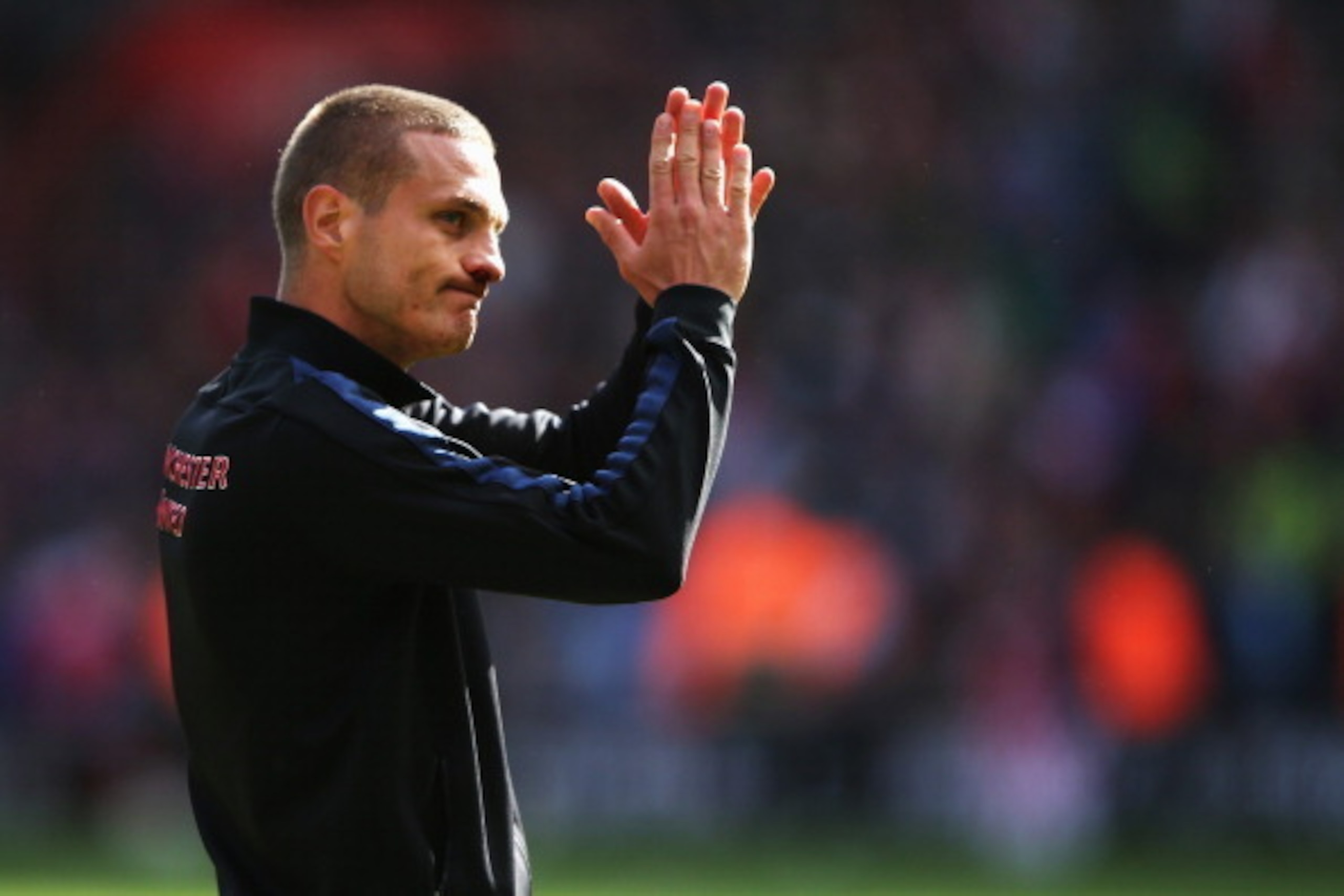 SOUTHAMPTON, ENGLAND - MAY 11:  Nemanja Vidic of Manchester United applauds his sides fans after his final game for his club following the Barclays Premier League match between Southampton and Manchester United at St Mary's Stadium on May 11, 2014 in Sout