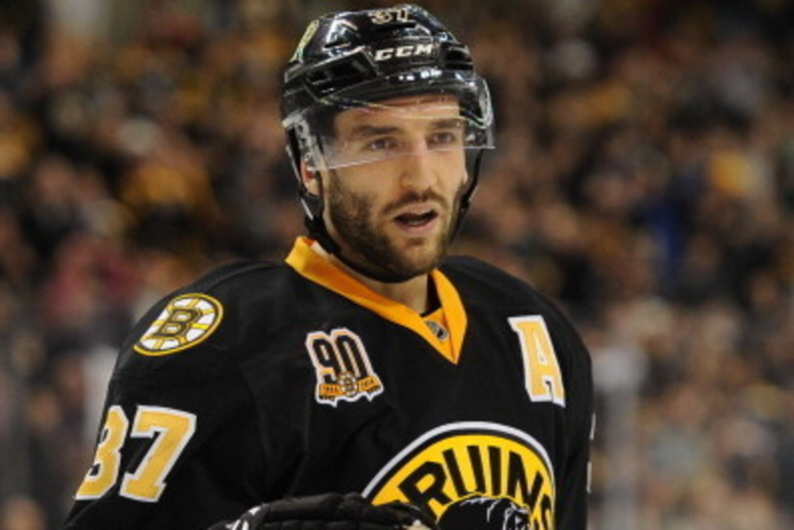 BOSTON, MA - APRIL 5: Patrice Bergeron #37 of the Boston Bruins against the Philadelphia Flyers at the TD Garden on April 5, 2014 in Boston, Massachusetts. (Photo by Brian Babineau/NHLI via Getty Images)