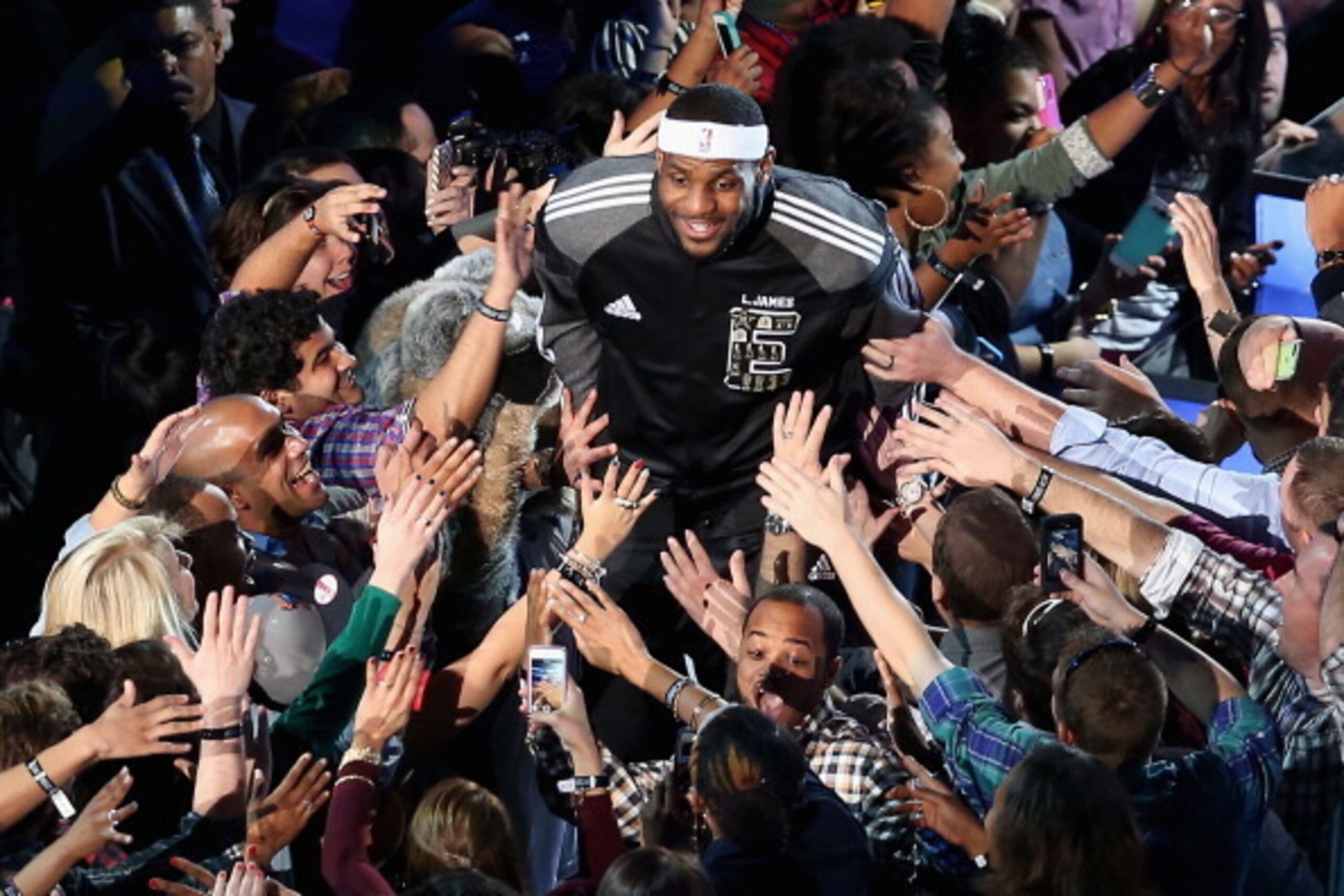 NEW ORLEANS, LA - FEBRUARY 16:  Eastern Conference LeBron James #6 of Miami Heat high fives fans as he is introduced to the 2014 NBA All-Star game agaisnt the Western Conference at the Smoothie King Center on February 16, 2014 in New Orleans, Louisiana. N