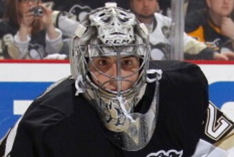 PITTSBURGH, PA - MAY 09:  Marc-Andre Fleury #29 of the Pittsburgh Penguins defends the net against the New York Rangers in Game Five of the Second Round of the 2014 Stanley Cup Playoffs at Consol Energy Center on May 9, 2014 in Pittsburgh, Pennsylvania.  