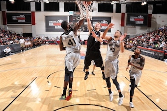 LAS VEGAS, NV - JULY 11: Nik Stauskas #10 of the Sacramento Kings shoots against the San Antonio Spurs at the Samsung NBA Summer League 2014 on July 11, 2014 at the Cox Pavilion in Las Vegas, Nevada. NOTE TO USER: User expressly acknowledges and agrees th