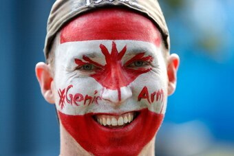 MELBOURNE, AUSTRALIA - JANUARY 17: A Canadian fan supports Eugenie Bouchard of Canada during day five of the 2014 Australian Open at Melbourne Park on January 17, 2014 in Melbourne, Australia.  (Photo by Renee McKay/Getty Images)