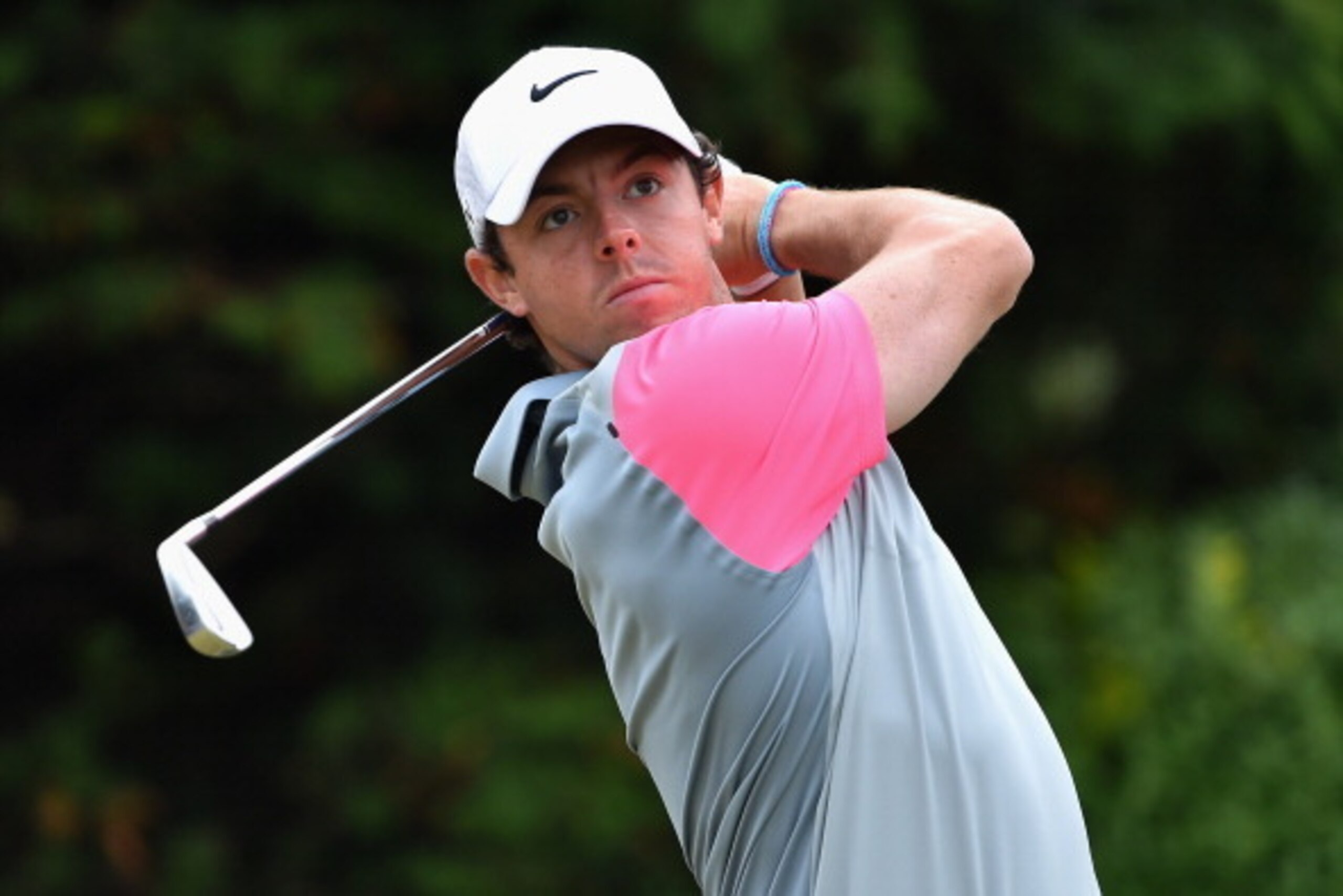 HOYLAKE, ENGLAND - JULY 20: Rory McIlroy of Northern Ireland tees off during the final round of The 143rd Open Championship at Royal Liverpool on July 20, 2014 in Hoylake, England. (Photo by Stuart Franklin/Getty Images) HOYLAKE, ENGLAND - JULY 20: Rory McIlroy of Northern Ireland tees off during the final round of The 143rd Open Championship at Royal Liverpool on July 20, 2014 in Hoylake, England. (Photo by Stuart Franklin/Getty Images)