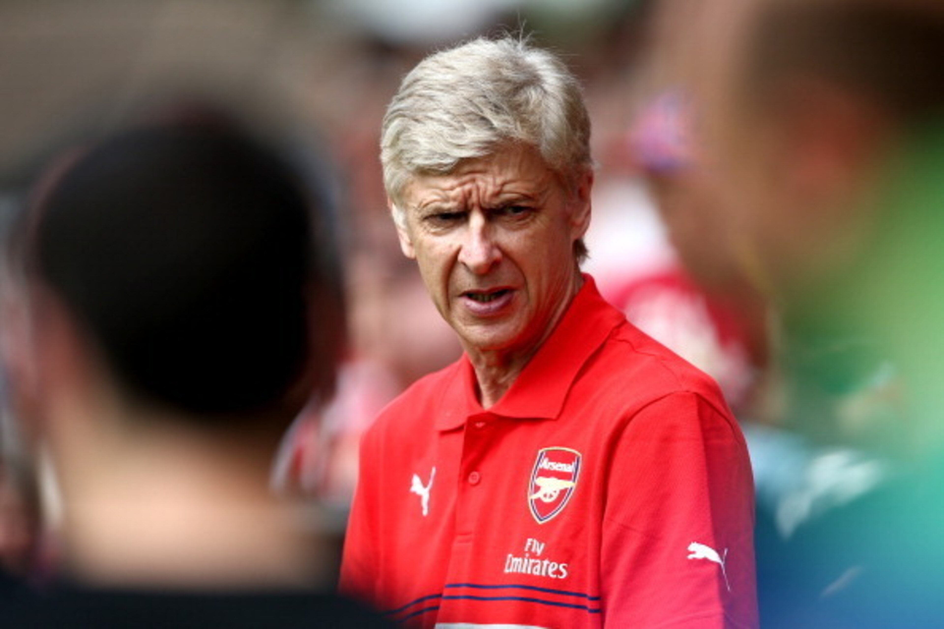 BOREHAMWOOD, ENGLAND - JULY 19: Arsenal manager Arsene Wenger looks on during the pre season friendly match between Borehamwood and Arsenal at Meadow Park on July 19, 2014 in Borehamwood, England. (Photo by Jordan Mansfield/Getty Images) BOREHAMWOOD, ENGLAND - JULY 19: Arsenal manager Arsene Wenger looks on during the pre season friendly match between Borehamwood and Arsenal at Meadow Park on July 19, 2014 in Borehamwood, England. (Photo by Jordan Mansfield/Getty Images)