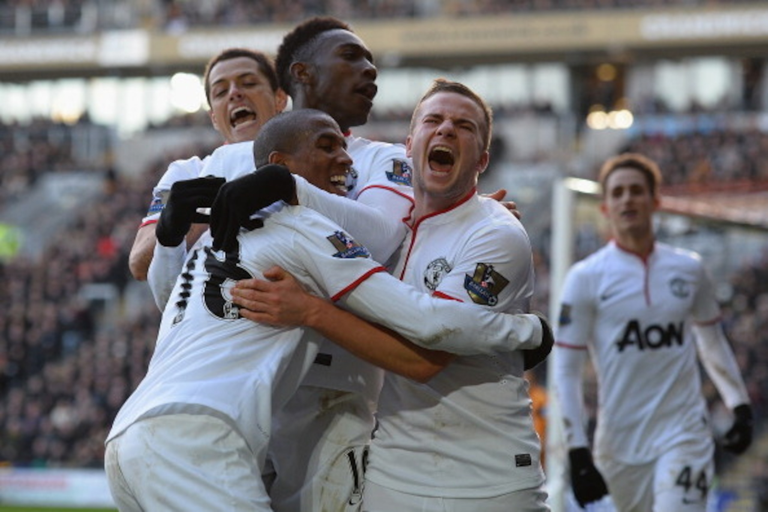 HULL, ENGLAND - DECEMBER 26: Tom Cleverley, Ashley Young, Danny Welbeck and Javier Hernandez of Manchestere United celebrate the third goal during the Barclays Premier League match between Hull City and Manchester United at KC Stadium on December 26, 2013