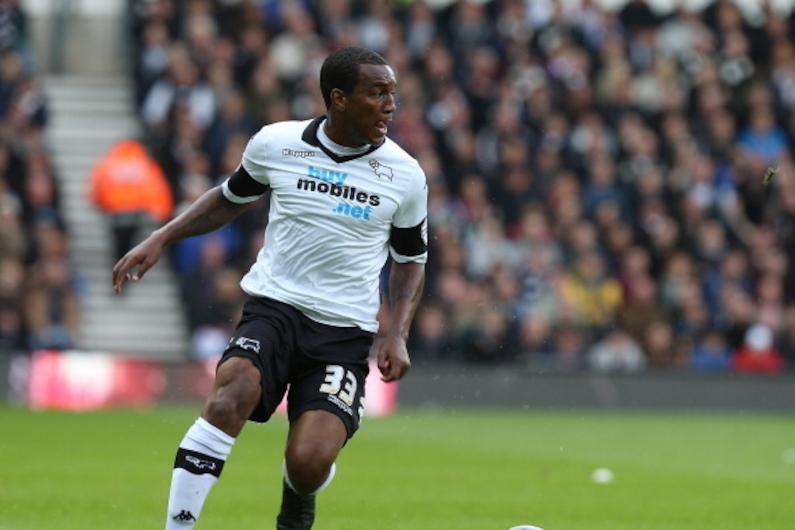 DERBY, ENGLAND - MAY 11:  Andre Wisdom of Derby County in action during the Sky Bet Championship Semi Final Second Leg between Derby County and Brighton & Hove Albion at iPro Stadium on May 11, 2014 in Derby, England.  (Photo by Pete Norton/Getty Images)