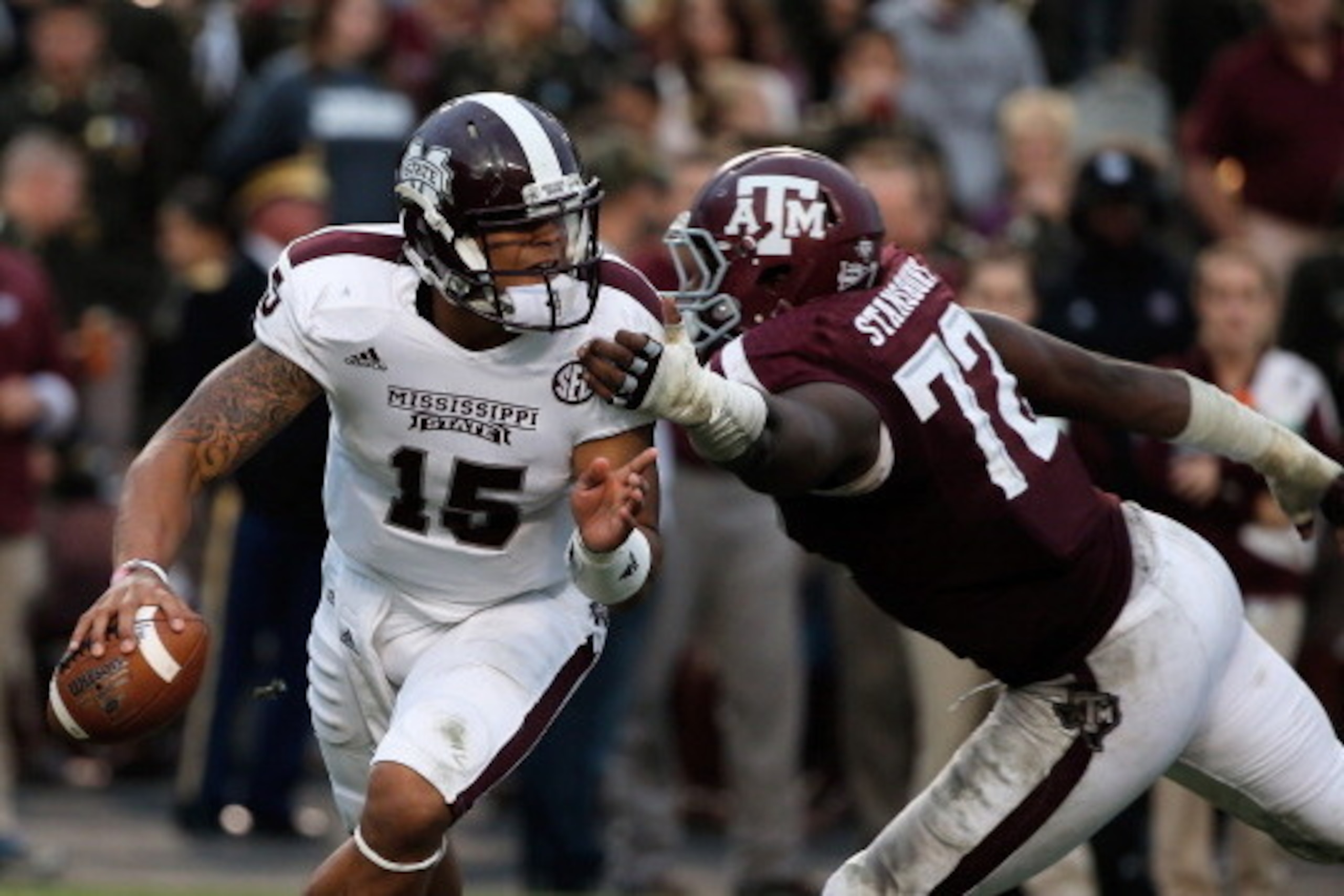 COLLEGE STATION, TX - NOVEMBER 09:  Gavin Stansbury #72 of the Texas A&M Aggies chases after Dak Prescott #15 of the Mississippi State Bulldogs in the third quarter at Kyle Field on November 9, 2013 in College Station, Texas.  (Photo by Scott Halleran/Get